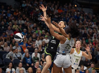 Lynx forward Cecilia Zandalasini lost control of the ball while defended by Wings forward Monique Billings (25) in the second quarter Sunday night at 