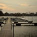 Boat docks on Boudin's Bay, Prior Lake where this marina proposed to double the length of its dock, sending it far out into the middle of a bay. Outra