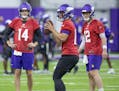Sam Darnold, left, works out with fellow Vikings quarterbacks Jaren Hall, center, and Nick Mullens on Tuesday.