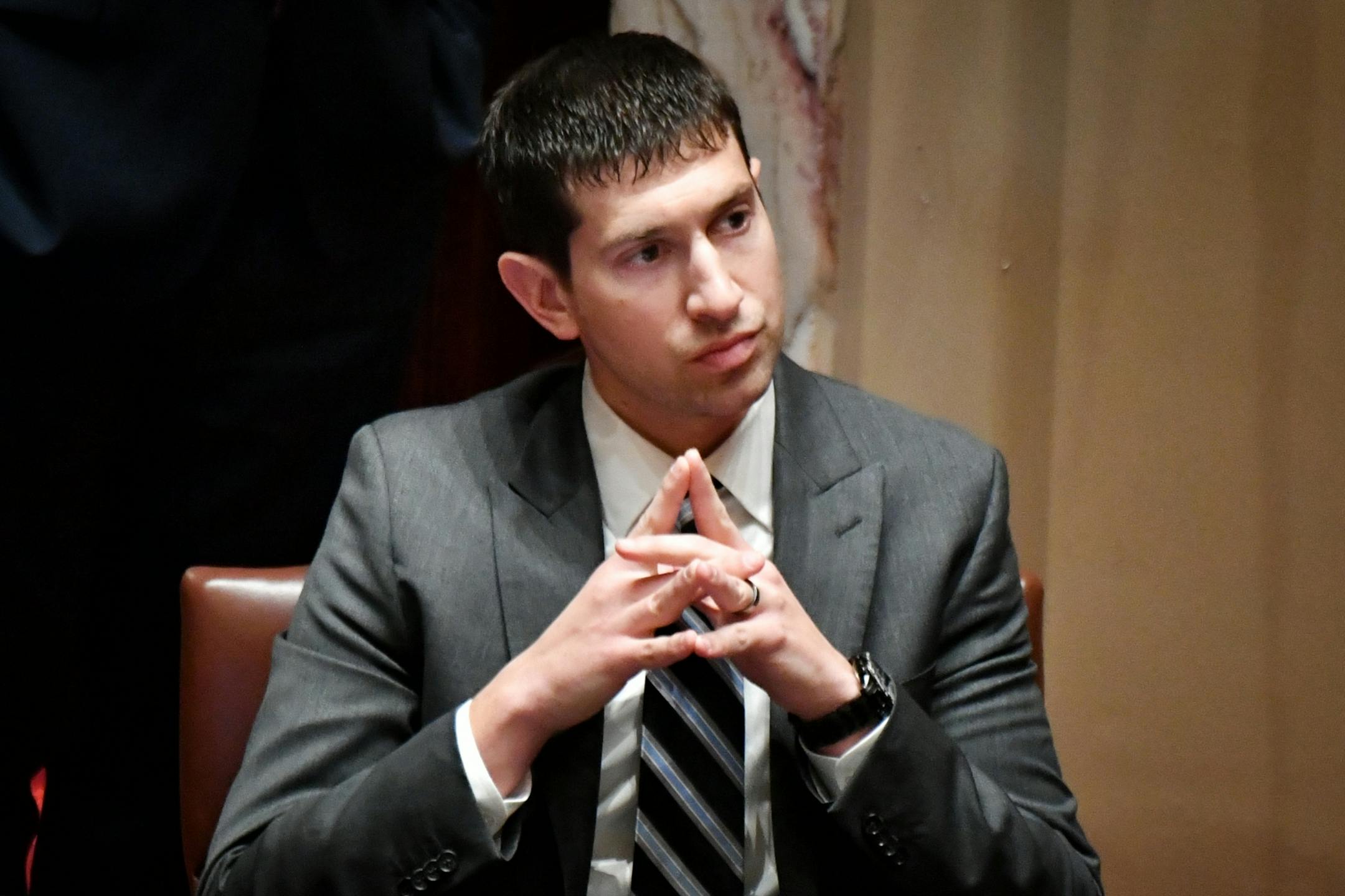 Sen. Jeremy Miller,R-Winona, chief author of the Sunday liquor bill listened as amendments were offered.