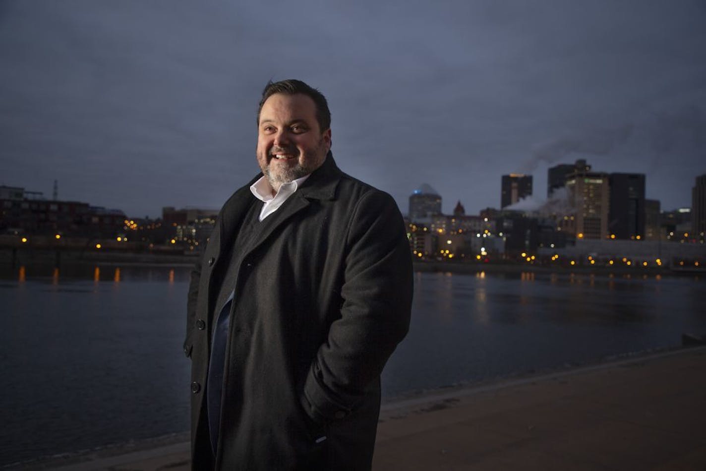 Portrait of Brian Dusek on Harriet Island across the river from the redevelopment site of the West Publishing building Monday November 26, 2018 in St. Paul, MN.