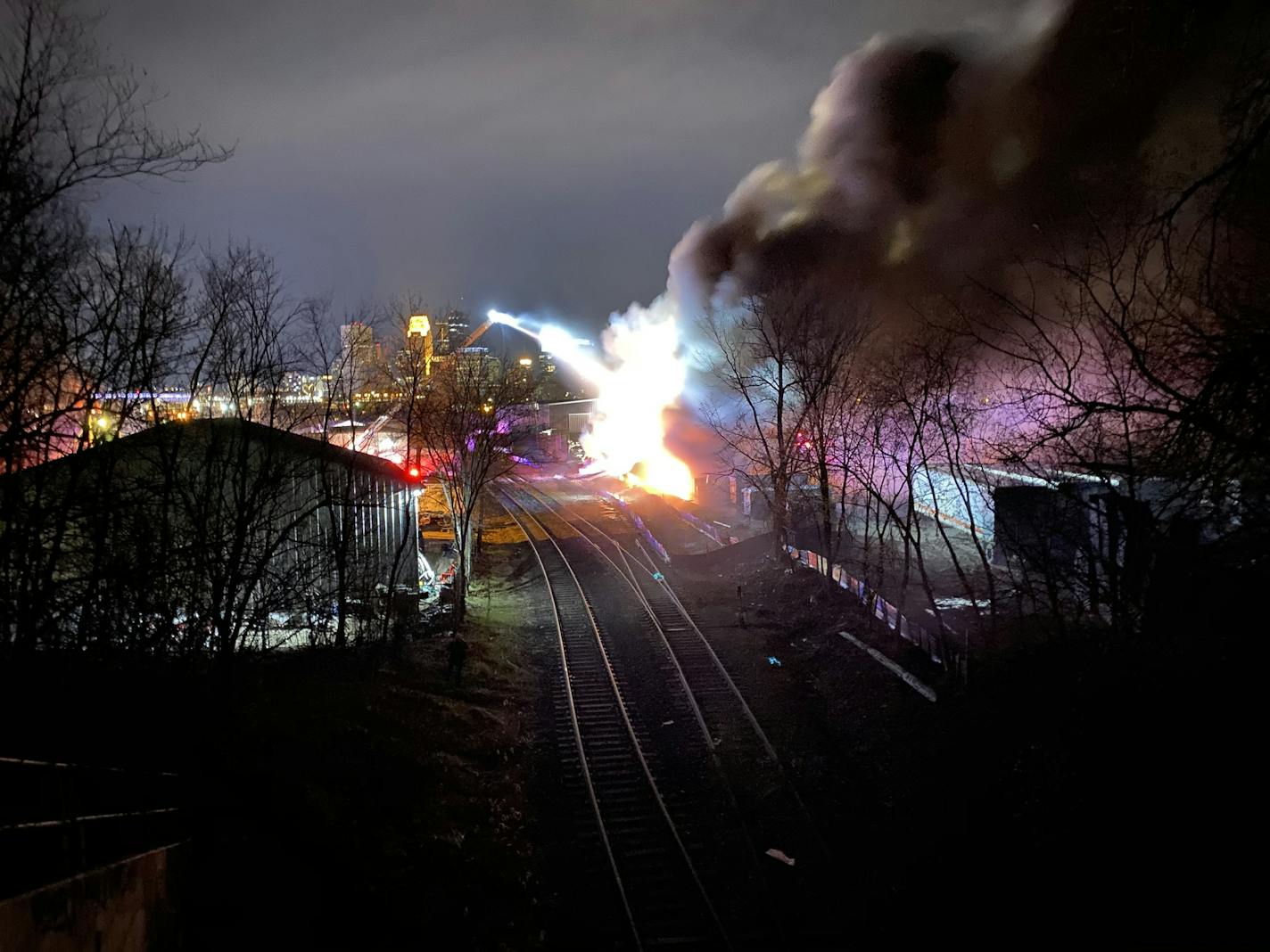 Minneapolis police are searching for an arsonist caught on surveillance video lighing a large bale of paper on fire at Pioneer Paper west of downtown.