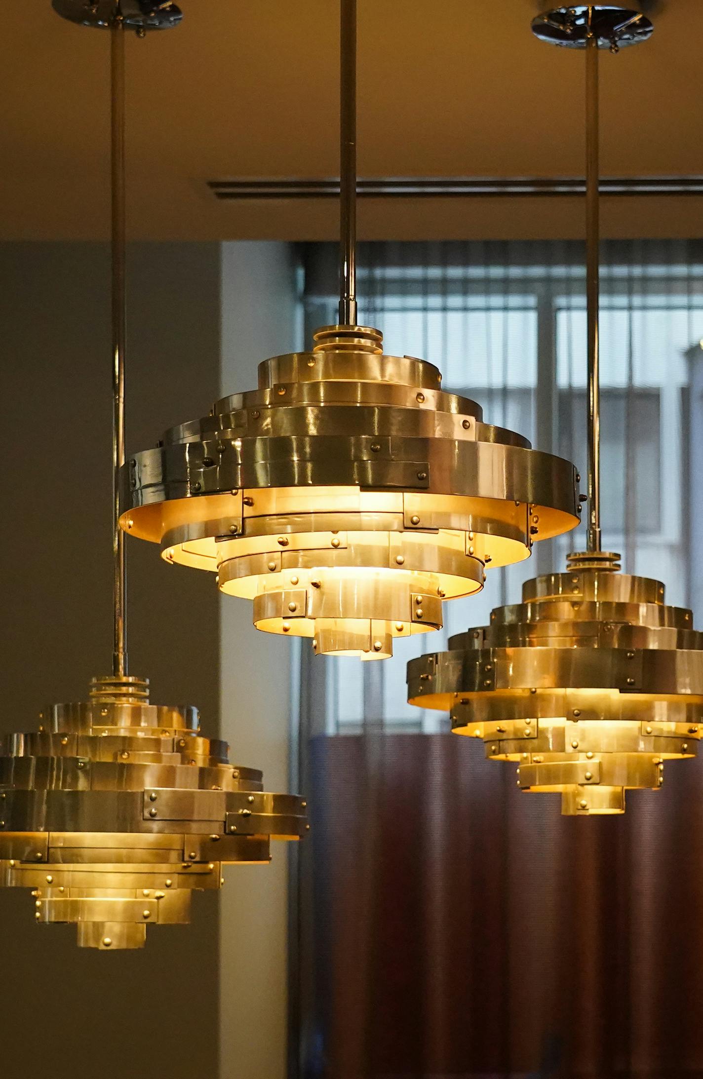 Light fixtures above a seating area on the main floor.