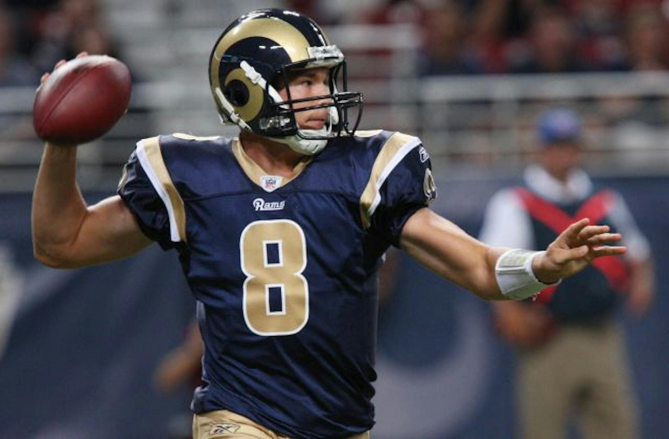 St. Louis Rams' quarterback Sam Bradford looks for an open receiver during the first half of NFL exhibition action against the Baltimore Ravens at the Edward Jones Dome in St. Louis, Missouri, on Thursday, September 2, 2010.