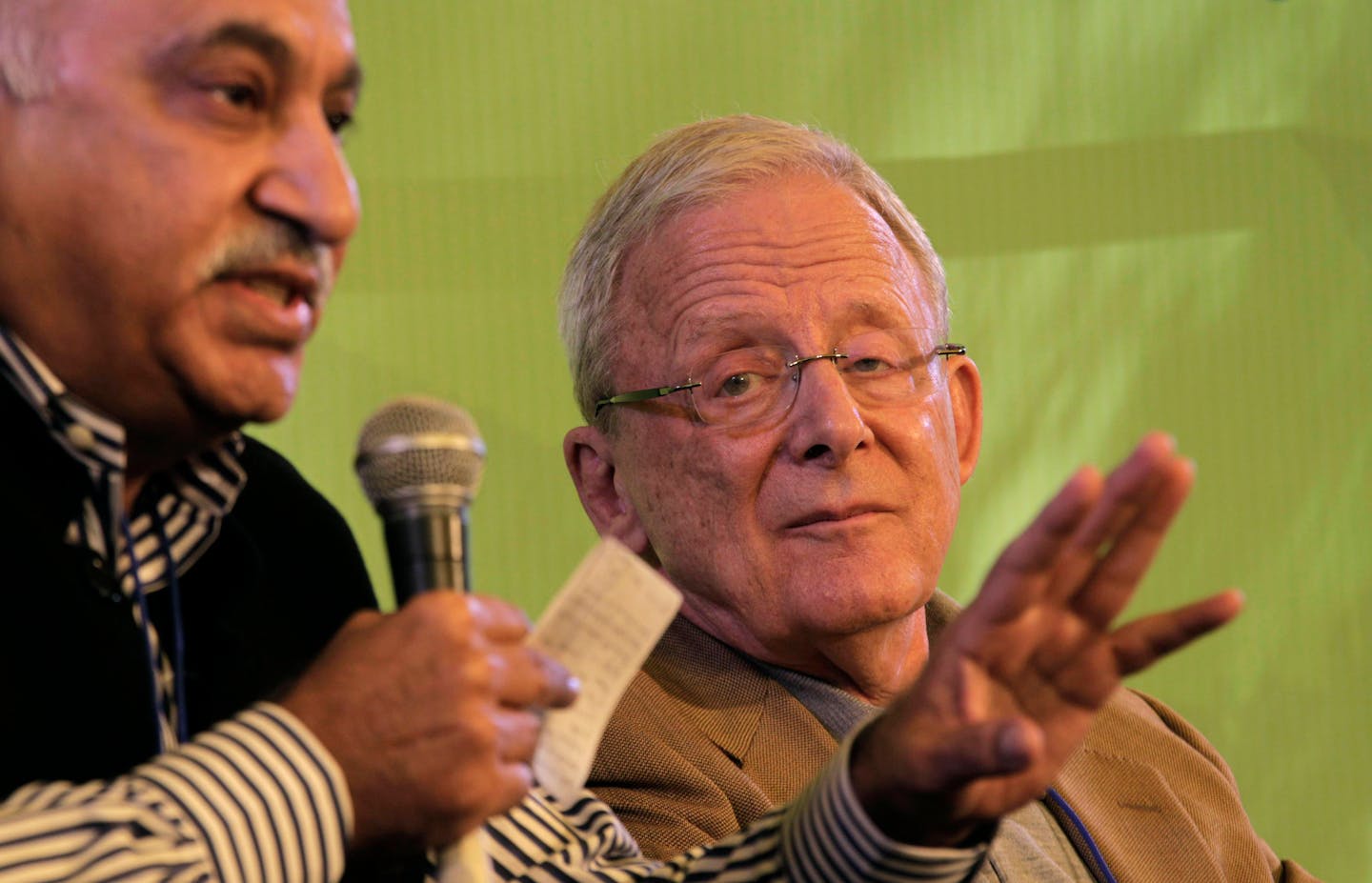 Indian journalist M.J. Akbar, left, speaks as former New York Times editor and Pulitzer Prize winner Joseph Lelyveld looks on during Jaipur Literature Festival in Jaipur, in the western Indian state of Rajasthan, India, Saturday, Jan. 21, 2012. (AP Photo/ Manish Swarup)