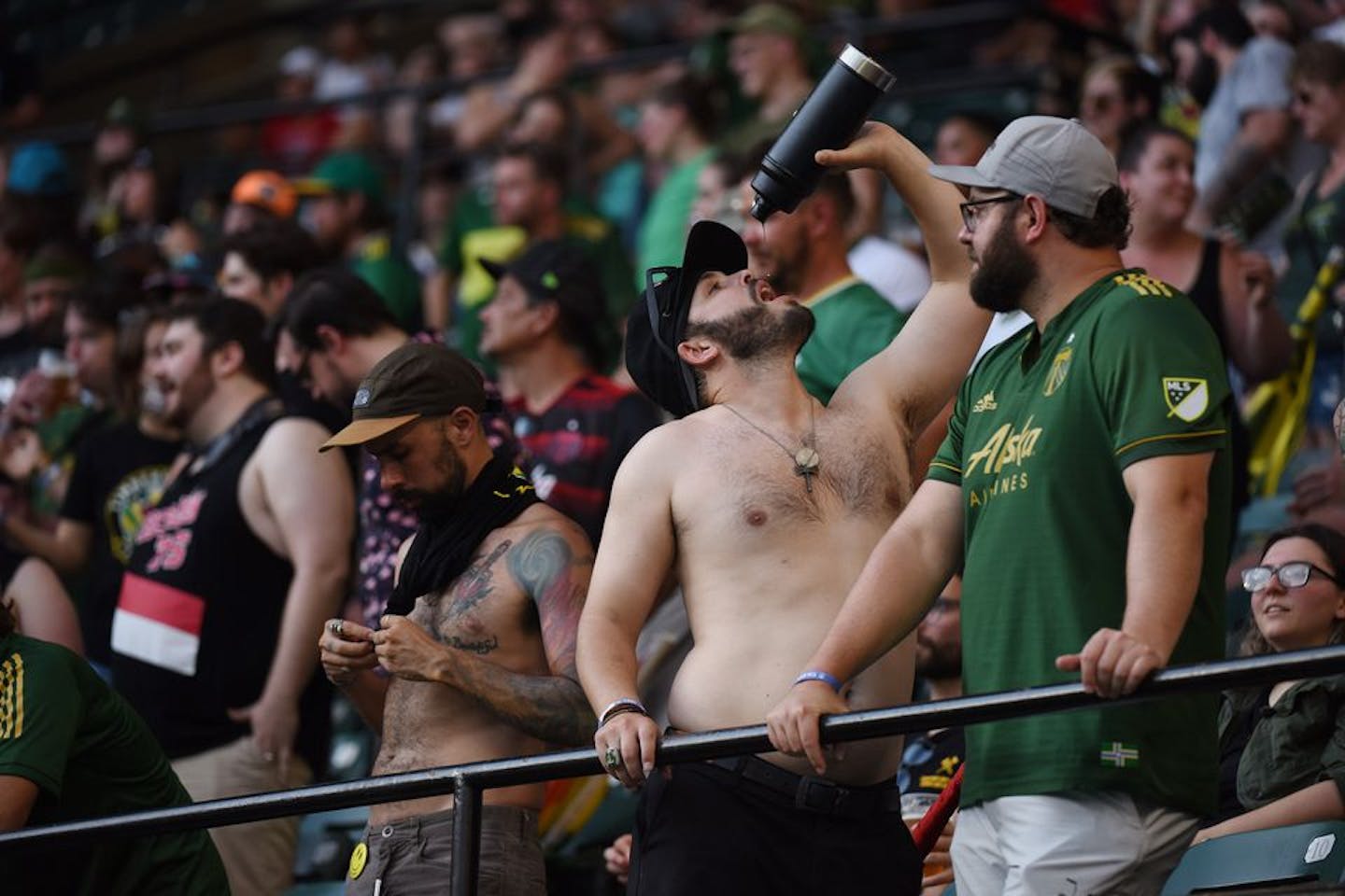 Fans try and stay cool amid sweltering, historically high temperatures in Portland before kickoff. The Portland Timbers play Minnesota United FC on Saturday, June 26, 2021 at Providence Park in Portland, Ore. Rockne Andrew Roll for The Oregonian/OregonLive.com