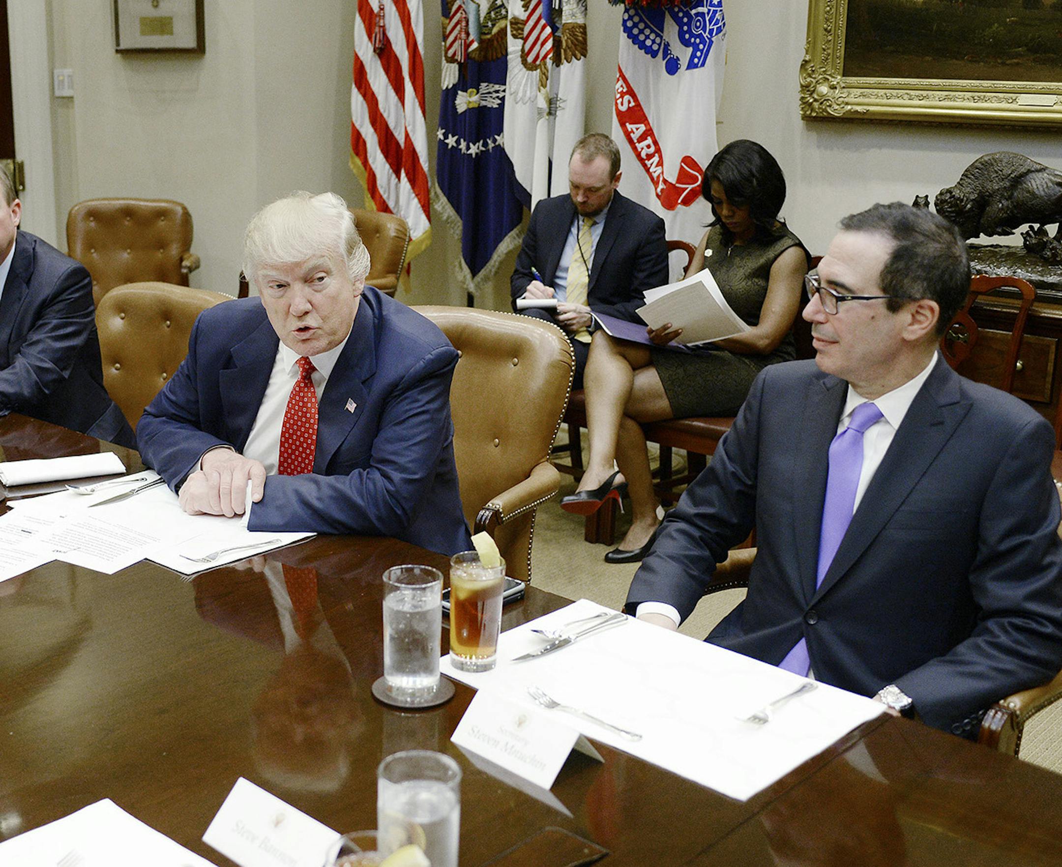 U.S. President Donald Trump discusses the Federal budget as Treasury secretary, Steve Mnuchin, right, looks on in the Roosevelt Room of the White House on Feb. 22, 2017 in Washington, D.C .(Olivier Douliery/Abaca Press/TNS) ORG XMIT: 1347973