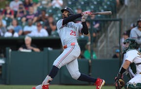 The Twins' Byron Buxton connects for a two-run double against the Athletics during the second inning Monday night in West Sacramento, Calif.