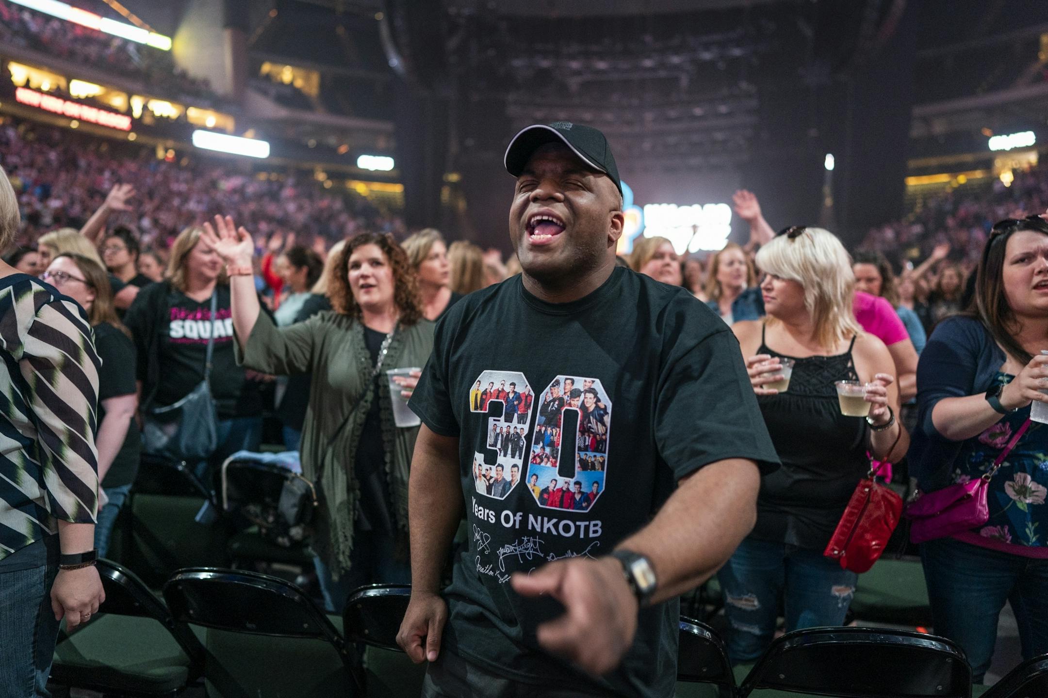 The crowd dances to a pre-show DJ before the New Kids on the Block show at Xcel Energy Center.
