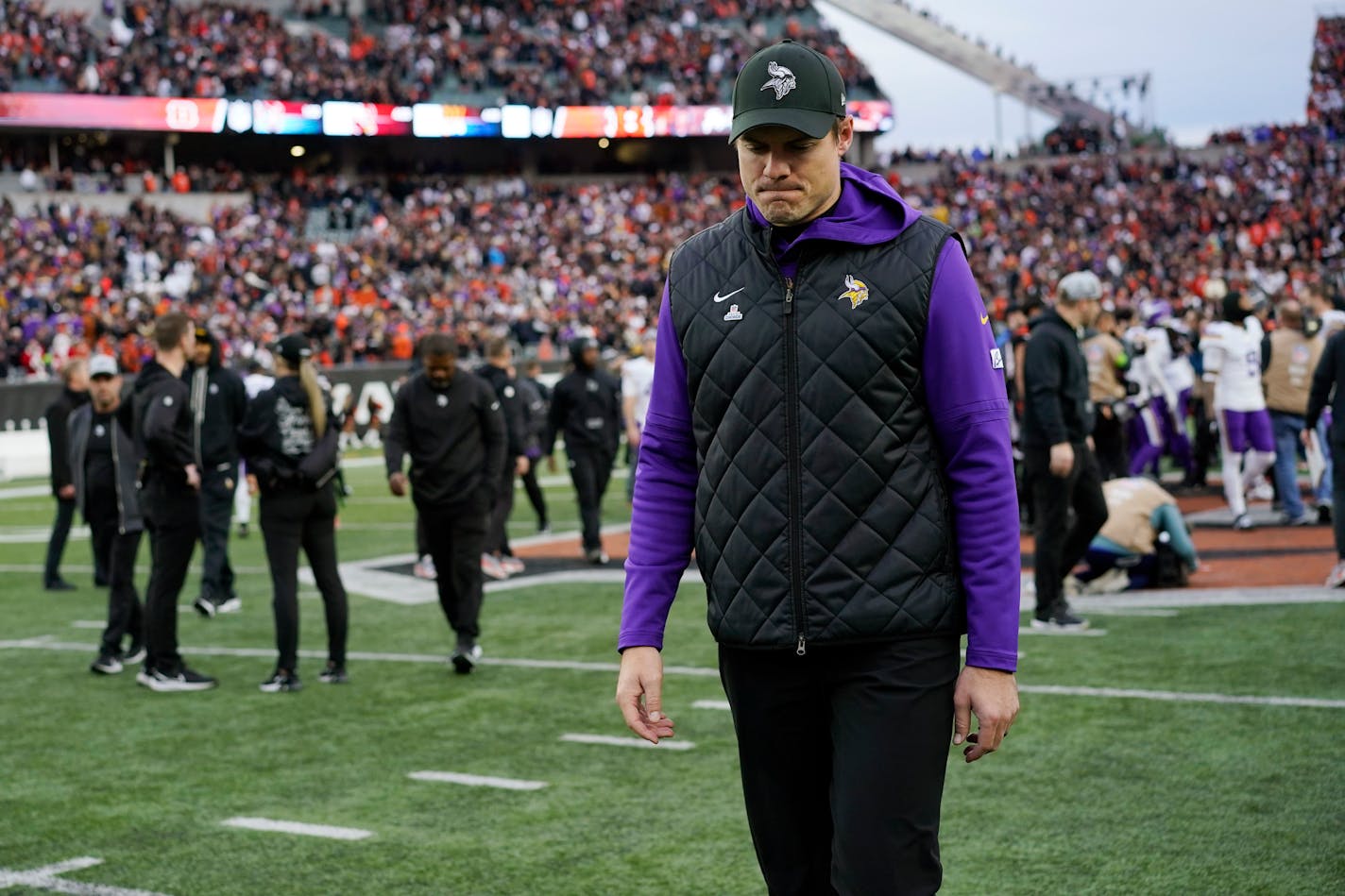 Minnesota Vikings head coach Kevin O'Connell walks off the field after an overtime loss to the Cincinnati Bengals in an NFL football game Saturday, Dec. 16, 2023, in Cincinnati. (AP Photo/Carolyn Kaster)