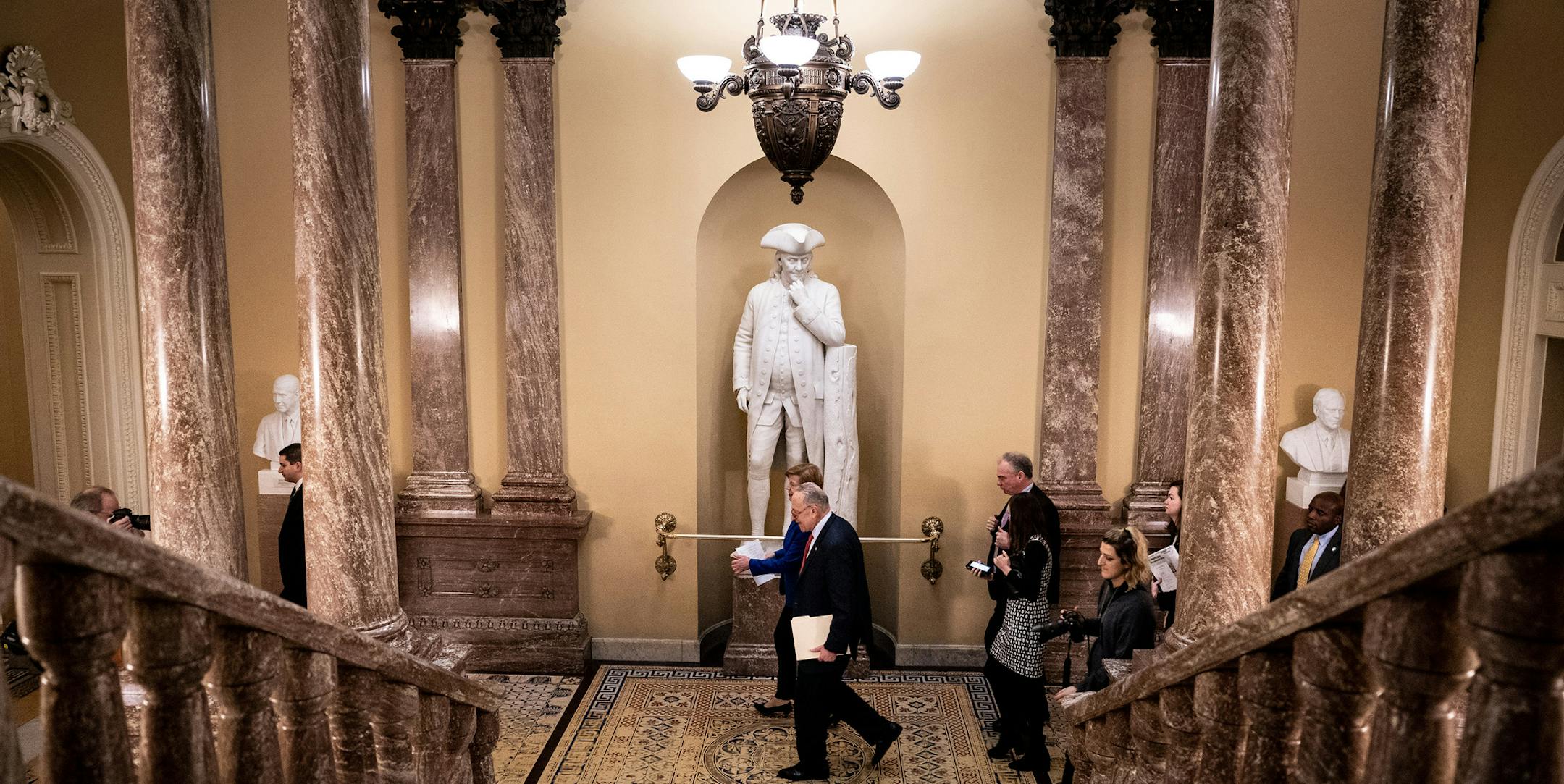 Senate Minority Leader Chuck Schumer (D-N.Y.) walks to a news conference after a Senate Democratic policy luncheon on Capitol Hill in Washington on Tuesday, Jan. 14, 2020. The House will vote on Wednesday to send its impeachment charges against President Trump to the Senate, allowing a long-awaited trial to begin in the coming days, House Speaker Nancy Pelosi (D-Calif.) announced Tuesday. (Erin Schaff/The New York Times)
