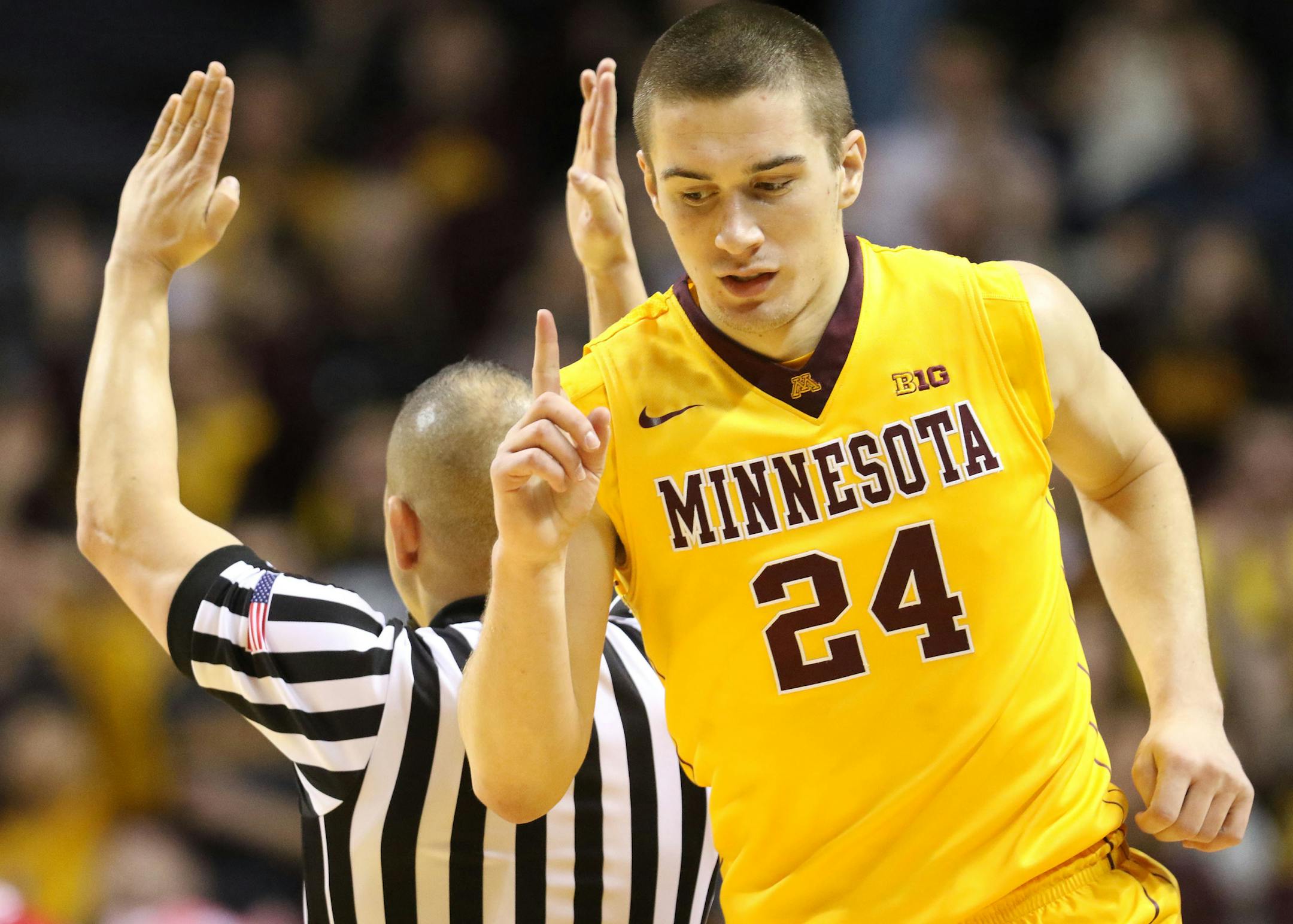 Minnesota's Joey King (24) signals after hitting a 3-point shot during the first half against Indiana on Saturday, Jan. 16, 2016, at Williams Arena in Minneapolis. Indiana won, 70-63. (David Joles/Minneapolis Star Tribune/TNS) ORG XMIT: 1179462