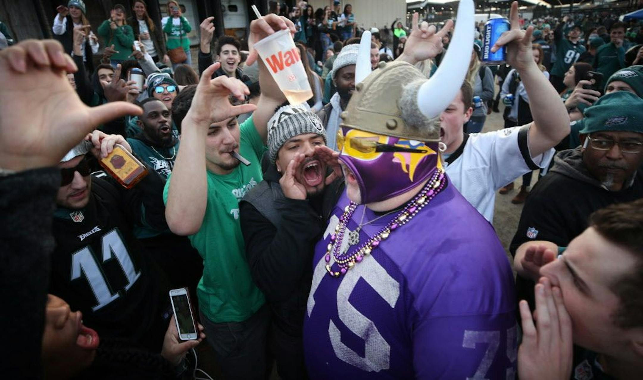 Vikings fan Andrew Grein of Edina, walked through a crowd of hostile Eagle fans before kickoff of the NFC Championship game at Lincoln Financial Field January 21, 2017 in Philadelphia, PA
