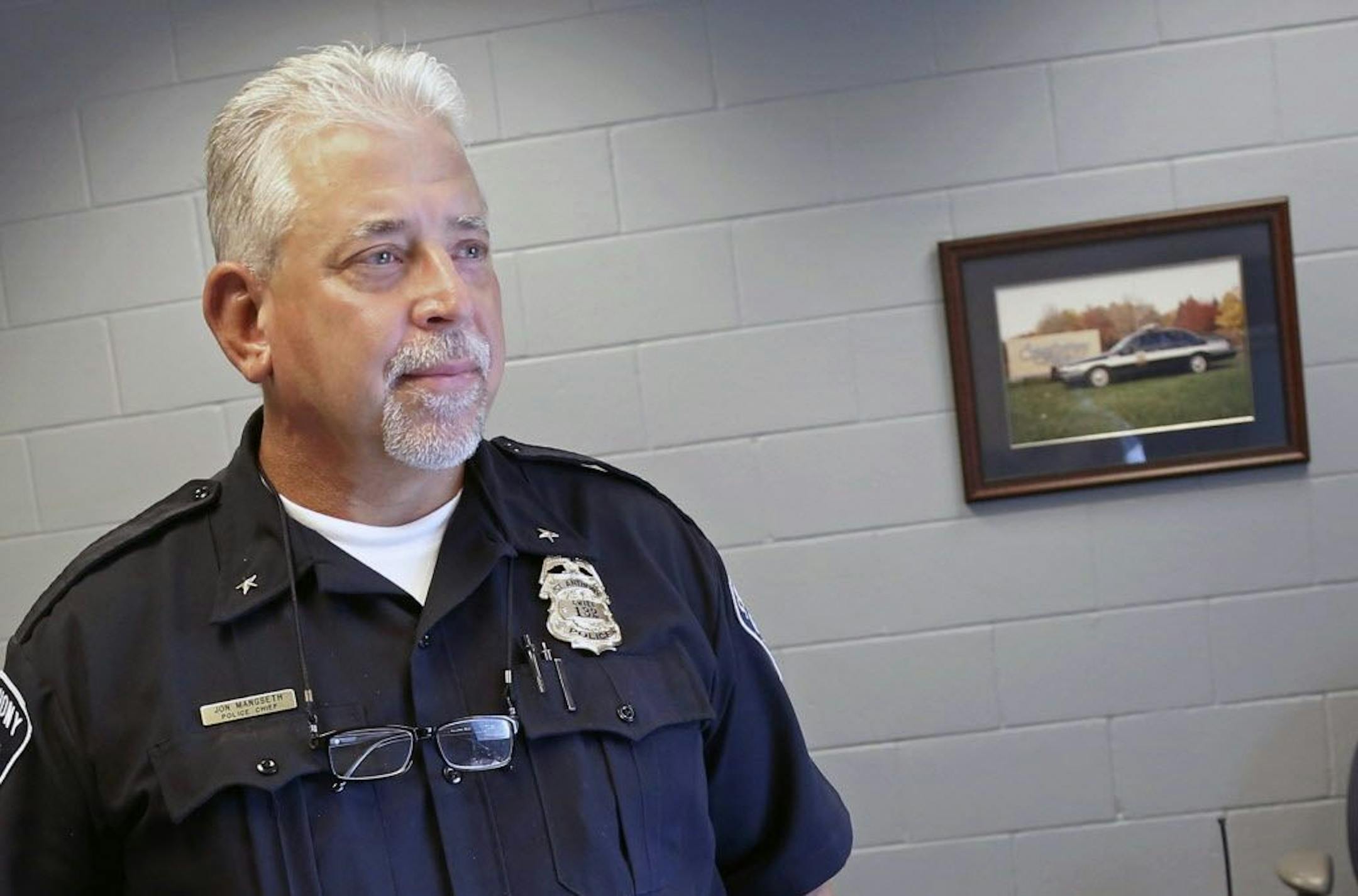 St. Anthony police chief Jon Mangseth poses for a photo Wednesday, Aug. 17, 2016, in St. Anthony, Minn. The chief of the suburban St. Paul police department whose officer shot and killed a black man during a July traffic stop is ready to defend his employee. Mangseth's interview with The Associated Press Wednesday marks his first public comments on the July 6 shooting of Philando Castile since the incident made St. Anthony's police department one of the latest to confront an officer-involved sho