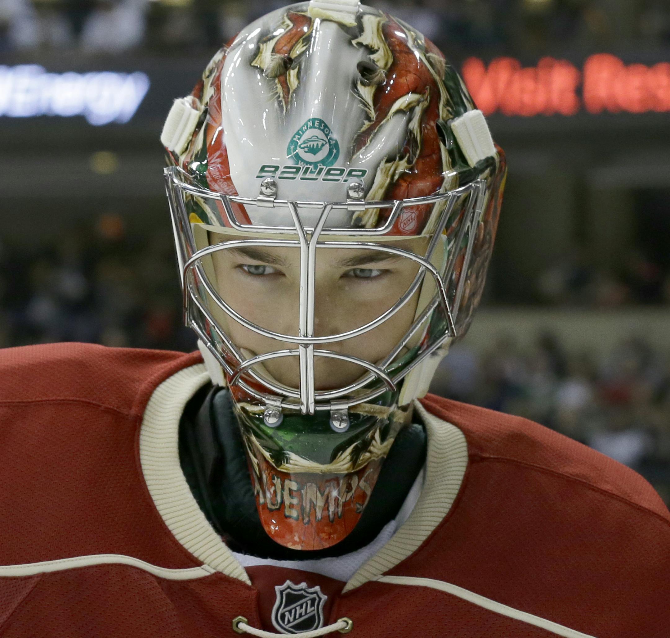 Minnesota Wild goalie Darcy Kuemper skates around during a timeout during the second period of a preseason NHL hockey game against the St. Louis Blues in St. Paul, Minn., Saturday, Oct. 4, 2014. (AP Photo/Ann Heisenfelt)