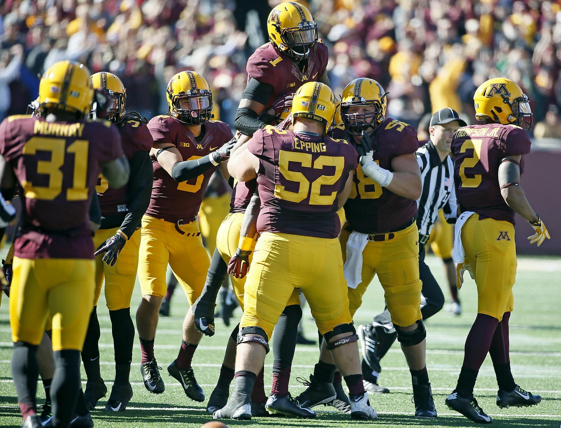 The Minnesota Gophers celebrated their 25-17 win over the Northwestern Wildcats at TCF Stadium, Saturday, October 11, 2014 in Minneapolis, MN.
