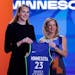 Connecticut's Dorka Juhasz, left, poses for a photo with commissioner Cathy Engelbert after being selected by the Minnesota Lynx at the WNBA basketbal