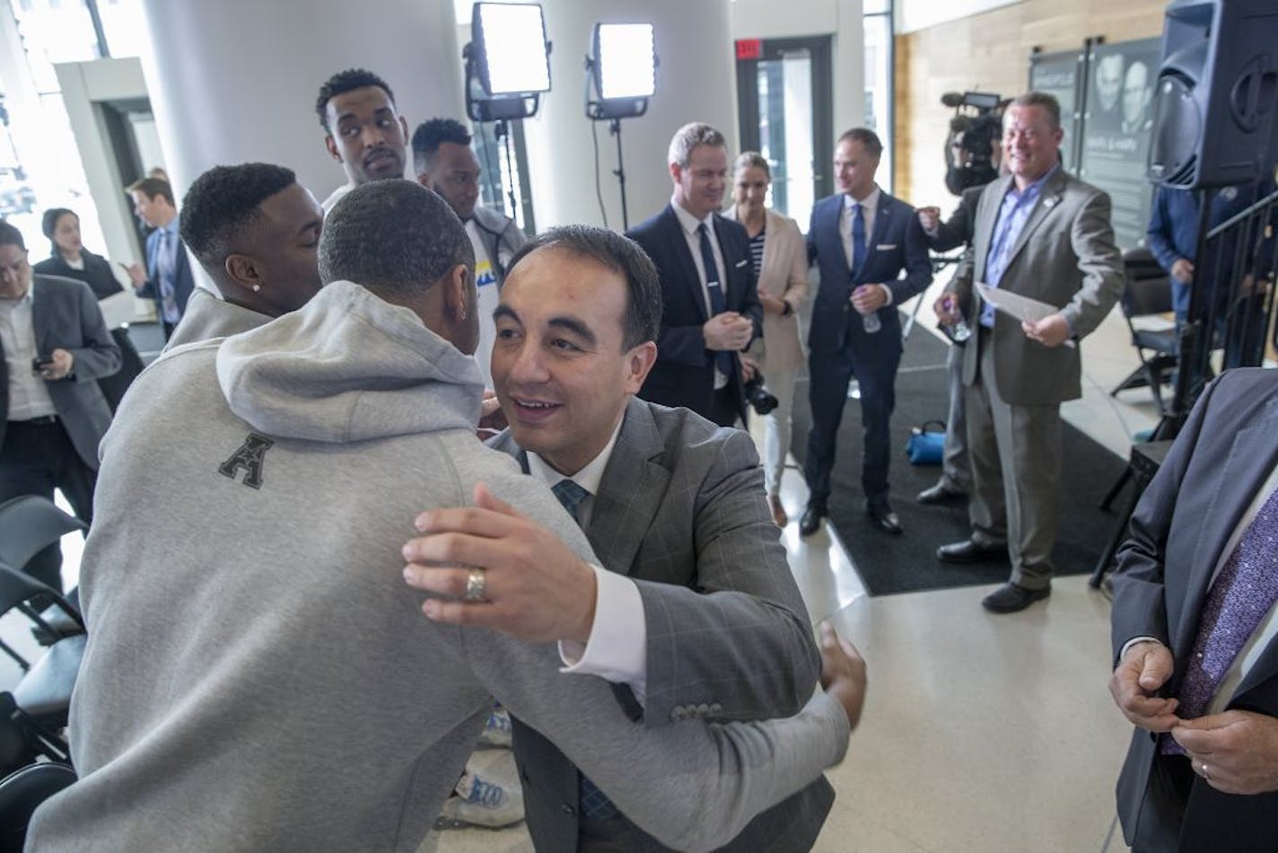 Minnesota Timberwolves new President of basketball operations Gersson Rosas was greeted by some of the Timberwolves players after a press conference at the Target Center, Monday, May 6, 2019.