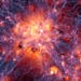 This image provided by the Illustris Collaboration in May 2014 shows dark matter density overlaid with the gas velocity field in a simulation of the e