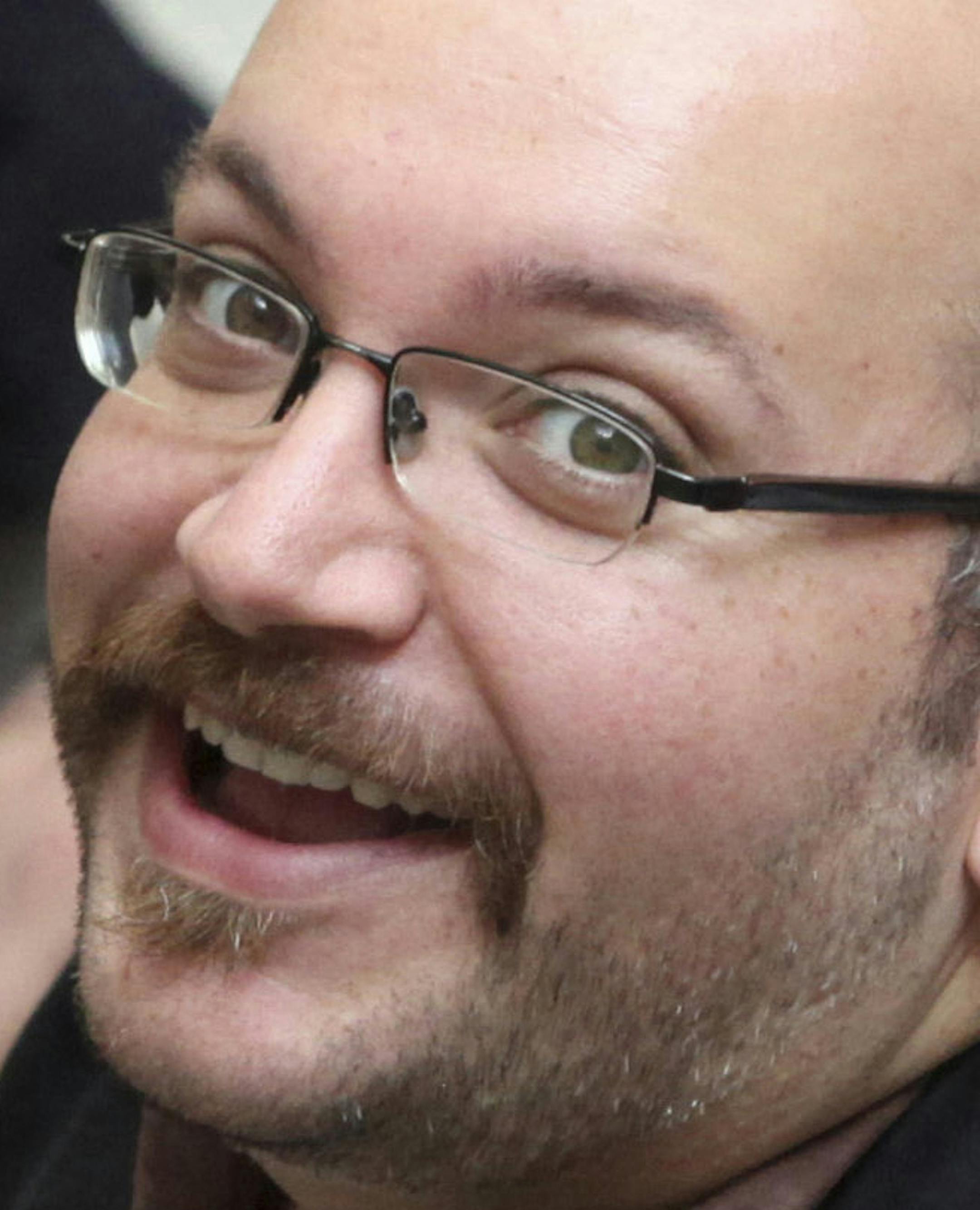 FILE - In this April 11, 2013 file photo, Jason Rezaian, an Iranian-American correspondent for the Washington Post, smiles as he attends a presidential campaign of President Hassan Rouhani in Tehran, Iran. Iran state television has reported that the government has released several dual-national prisoners. The Associated Press has confirmed that three of them were Washington Post reporter Jason Rezaian, former U.S. Marine Amir Hekmati and pastor Saeed Abedini. (AP Photo/Vahid Salemi, File)