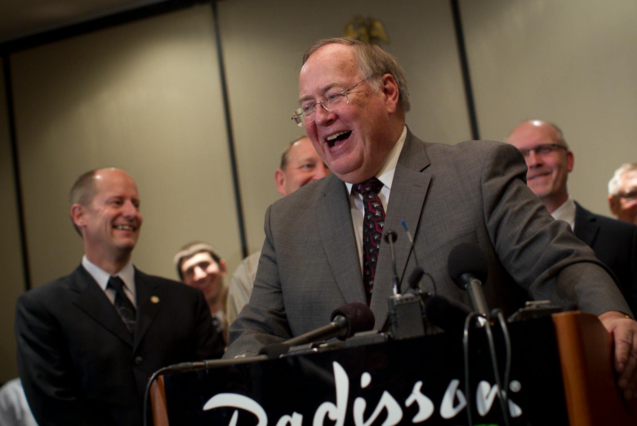 Dave Senjem spoke to the media after being voted in as majority leader in the Minnesota Senate Republicans in a closed door meeting Tuesday, December 27, 2011 at the Radisson Hotel in Roseville, Minn. He was surrounded by senators. ] (RENEE JONES SCHNEIDER/ reneejones@startribune.com) Dave Senjem