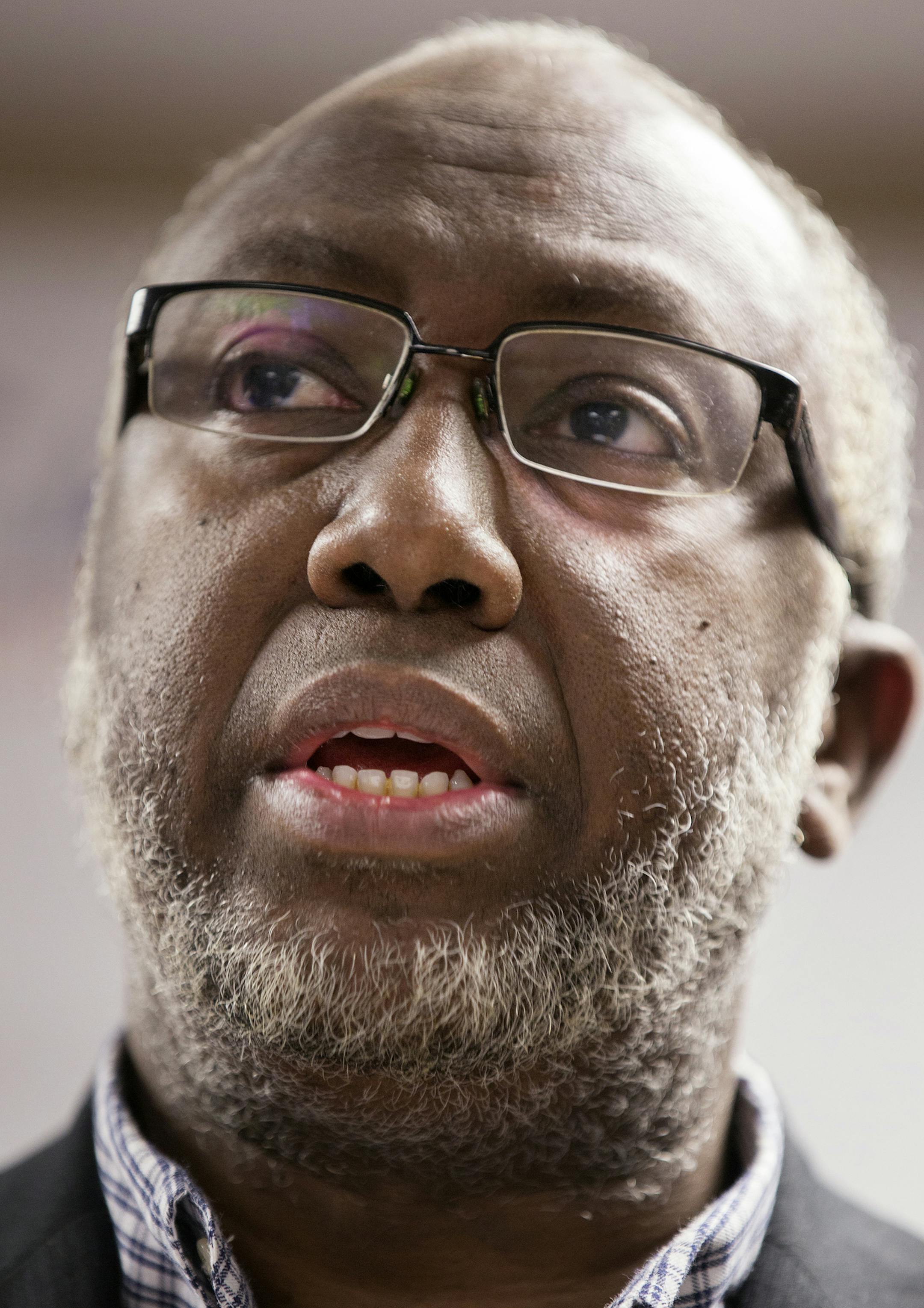 Imam Hassan Mohamud of the Minnesota Da'Wah Institute, along with members of the local Muslim and Somali community, raises concerns about the Department of Justice's new pilot program to counter violent extremism during a press conference on Tuesday, February 17, 2015. ] LEILA NAVIDI leila.navidi@startribune.com /