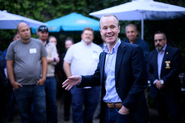 Republican attorney general candidate Jim Schultz speaks to a group of law enforcement officials and supporters during a campaign event Sept. 29 at Bu