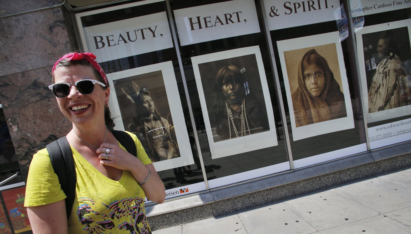 Joan Vorderbruggen with art works in background. ] Joan Vorderbruggen works through Hennepin Theatre Trust to maximize local artists works by displaying them in empty Hennepin Ave. storefront windows and pop-up parks. (MARLIN LEVISON/STARTRIBUNE(mlevison@startribune.com)