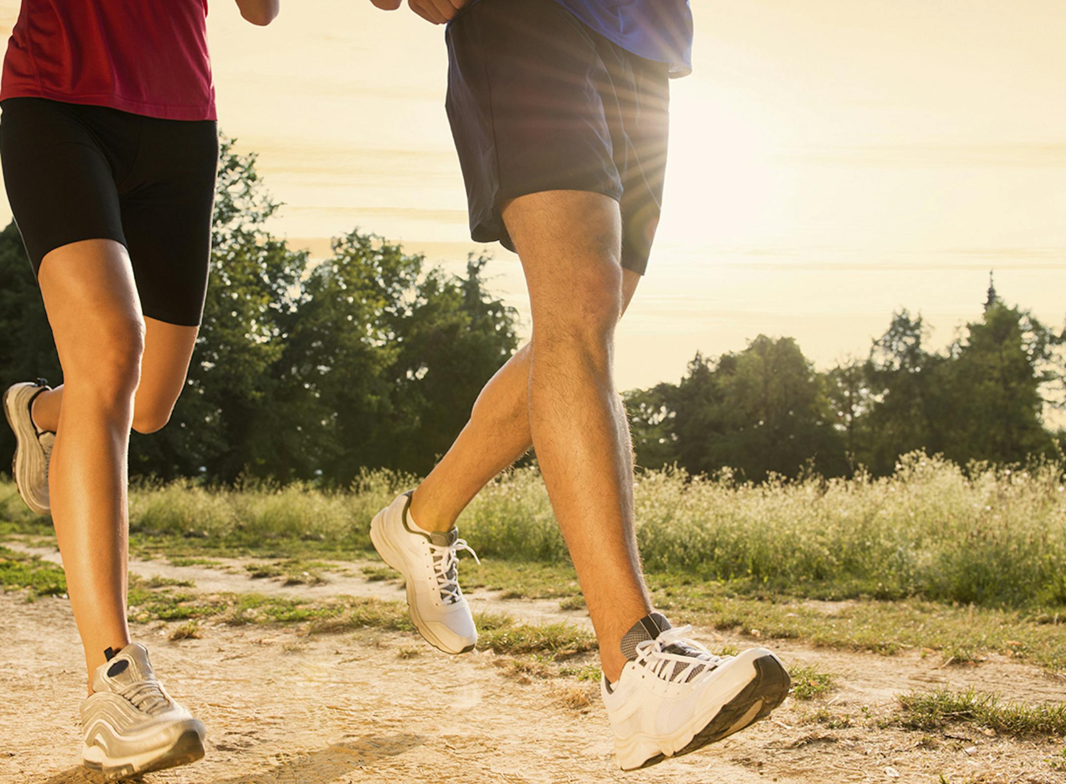 Legs View Of A Couple Jogging Outdoor in the Park