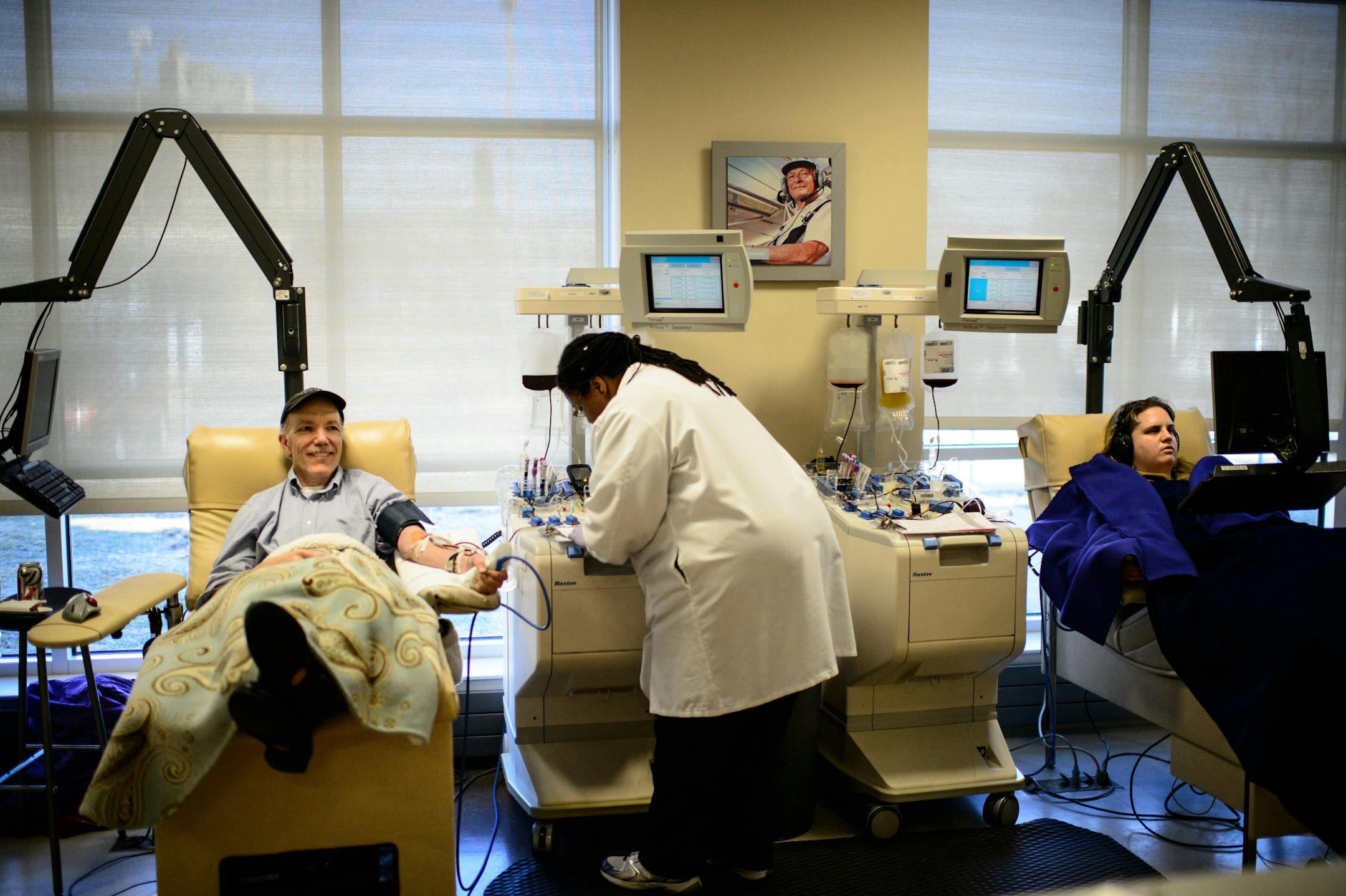 Memorial Blood Centers phlebotomist Leah Thompson prepared Jim Irvine for a blood donation. Memorial Blood Centers, a member of Blood Centers of America which announced a merger with GSABC Cooperative Corp.