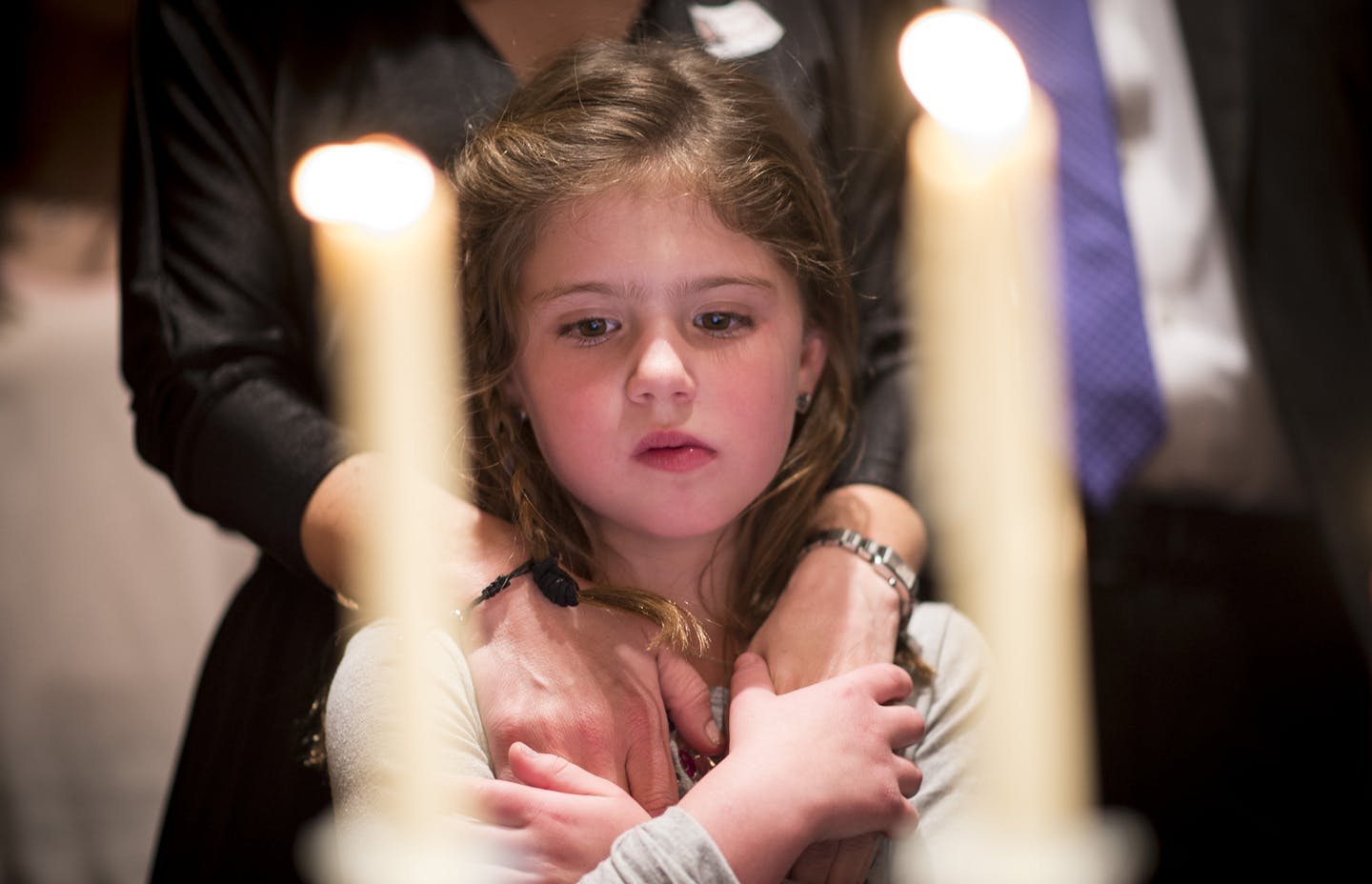 Audrey Kibort, 6, is embraced by her mother Cym Kibort during a ceremony memorializing the six million Jews that were killed in the Holocaust, including members of the Mandelbaum family of which they are descendants. ] (Aaron Lavinsky | StarTribune) Seventy years ago, five siblings from the Mandelbaum family were liberated from concentration camps in Poland. The siblings eventually moved to Minnesota, and three of them are still here and alive today. Last weekend, their families -- now 133 desce