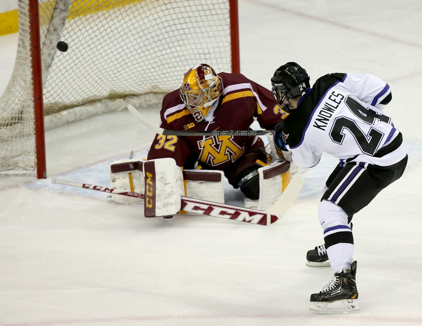 Minnesota State's Brett Knowles attempted to score on Gophers goalie Adam Wilcox during the first period of Friday's game.