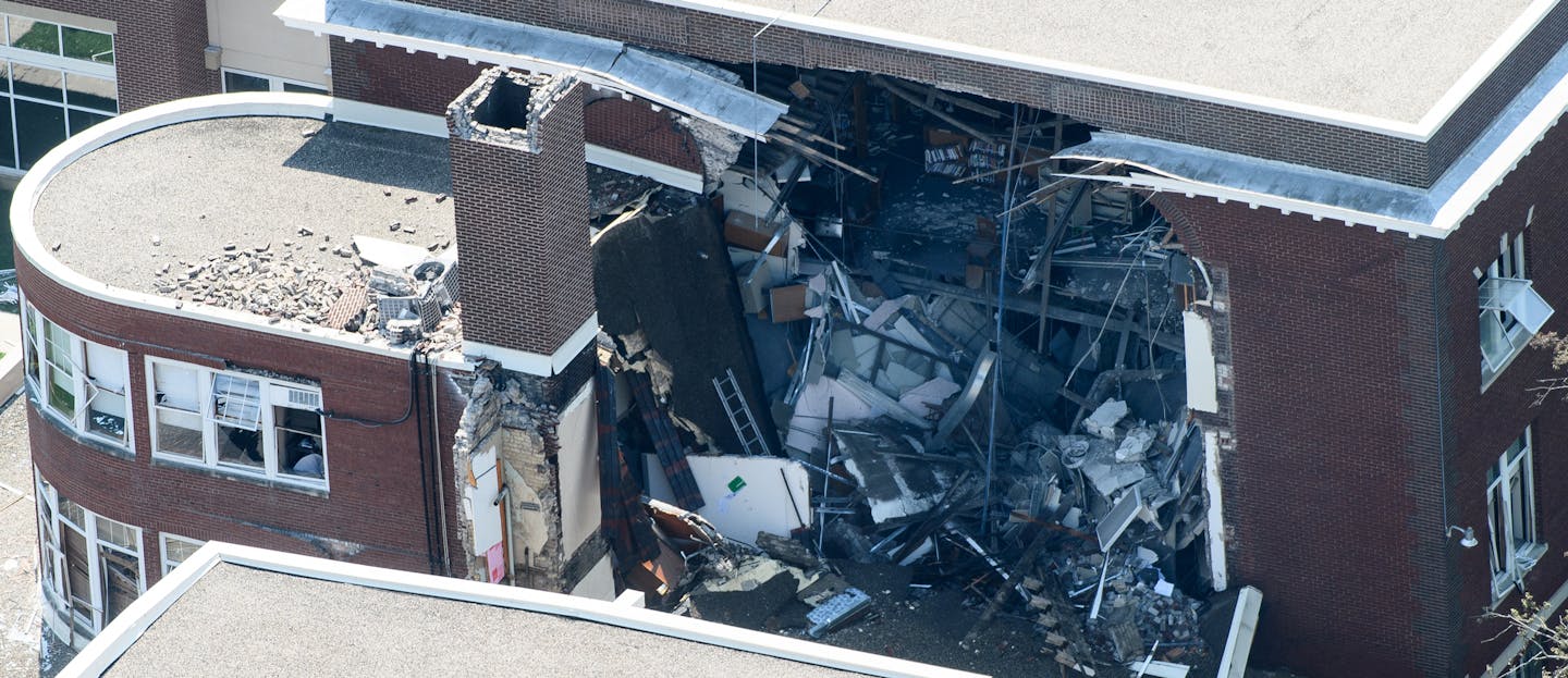 Books were visible from the inside of Minnehaha Academy following an explosion Wednesday morning. ] AARON LAVINSKY &#xef; aaron.lavinsky@startribune.com Aerial photos of explosion aftermath at Minnehaha Academy taken Wednesday, August 2, 2017 in Minneapolis, Minn.