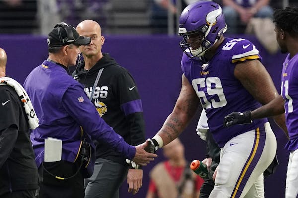 Agent: Tackle Hill signing one-year deal to stay with Vikings