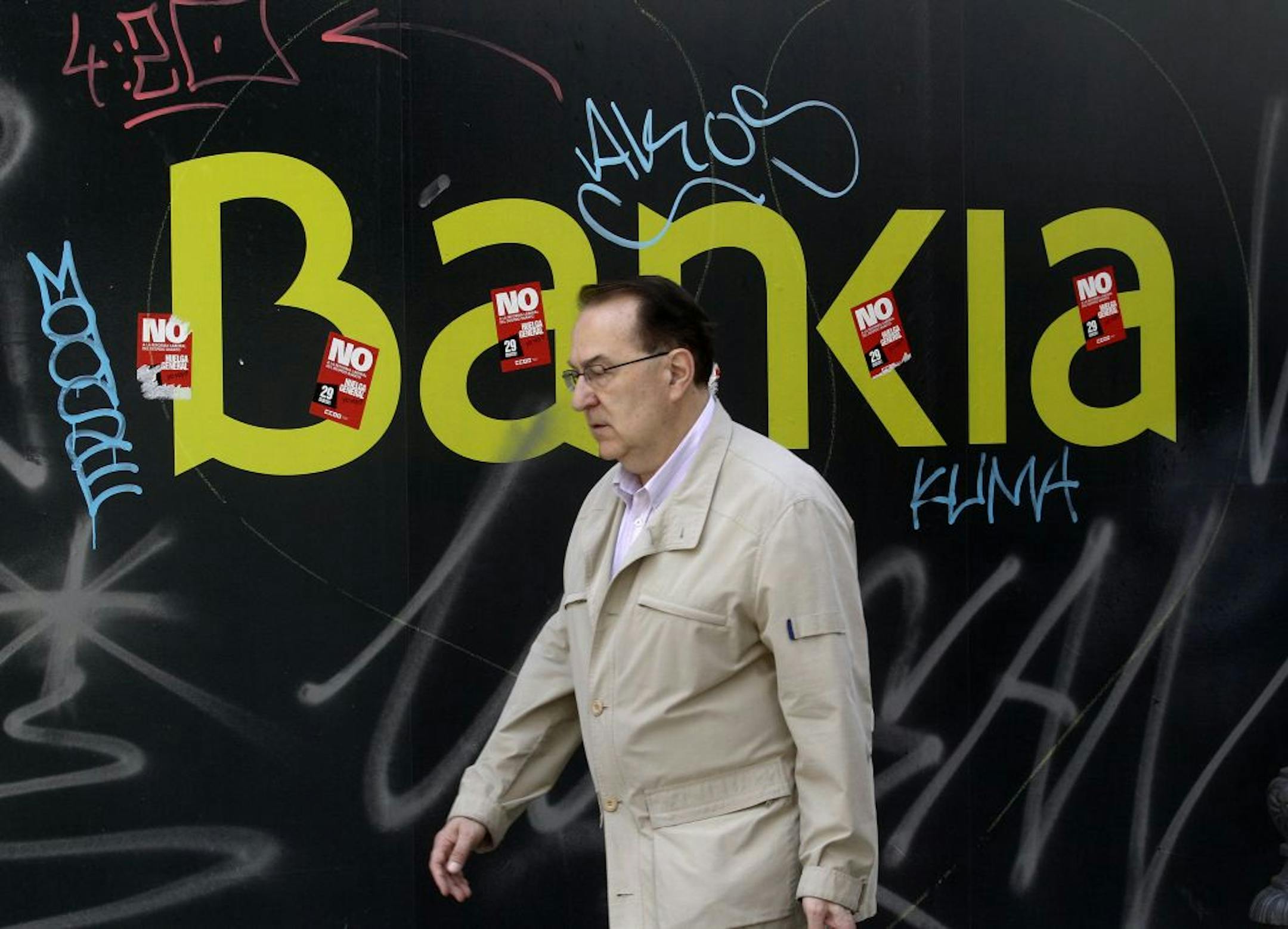 A man walks past the Bankia bank foundation in Madrid last month.