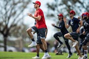 Starting pitcher Joe Ryan (in red) and the rest of the Twins, shown working out Wednesday in Fort Myers, Fla., need to stay healthy if the team is to 