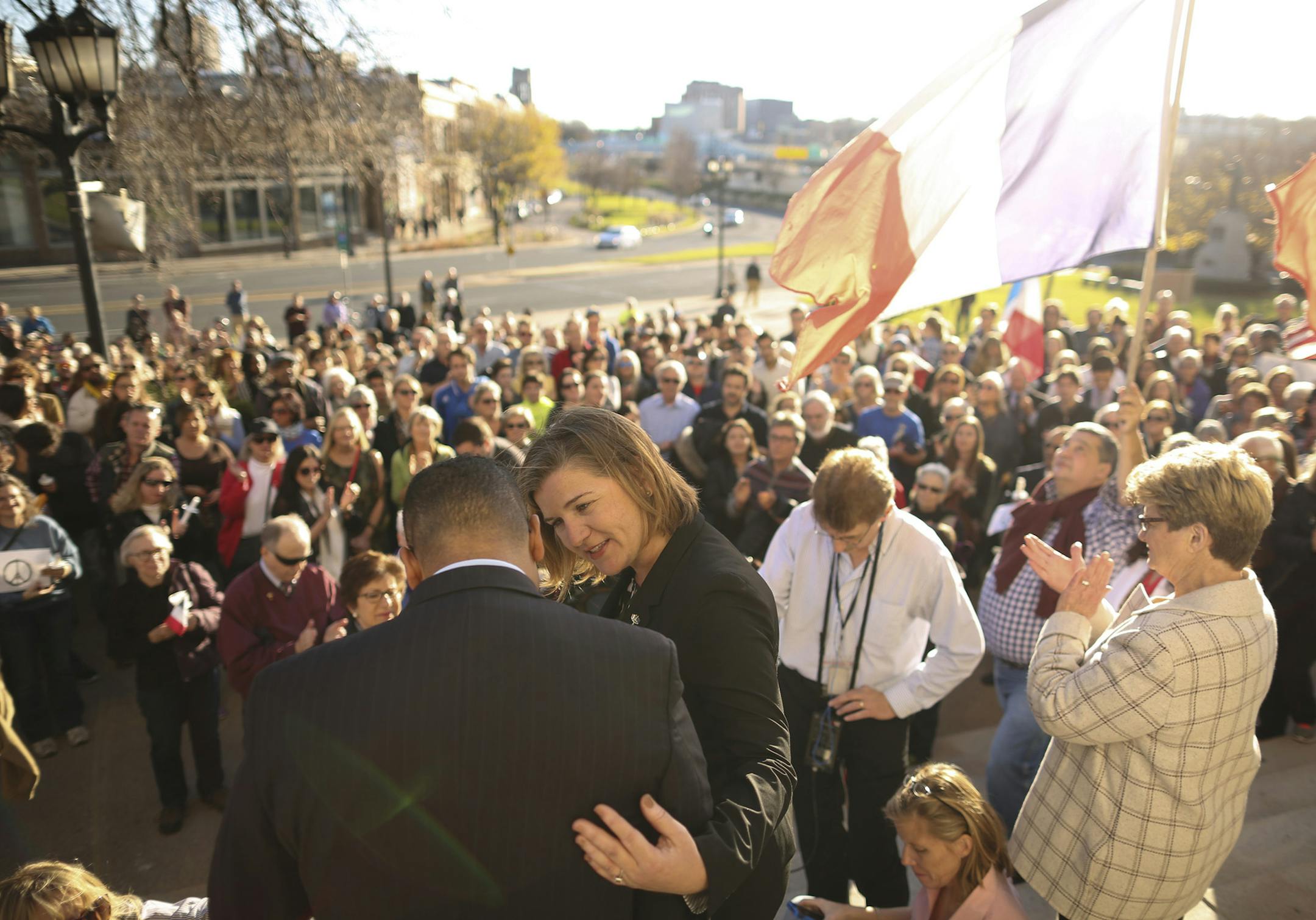 Honorary Consul of France, Christina Selander Bouzouina thanked Congressman Keith Ellison after he addressed the crowd from the steps of the Basilica Sunday afternoon. ] JEFF WHEELER ï jeff.wheeler@startribune.com Several hundred marchers walked from the Alliance FranÁaise to the Basilica of St. Mary for to show support for the people of Paris Sunday afternoon, November 15, 2015 in Minneapolis. Once at the Basilica, most attended the Solemn Vespers for Peace and Justice led by Fr. John