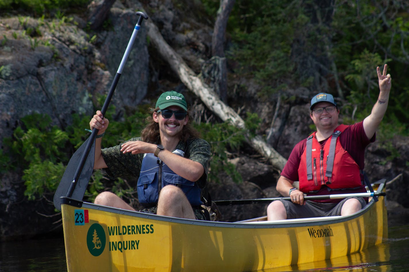 Wilderness Inquiry trip leader Ryan Stumbo paddles in the BWCA with Andrew, one of the participants on a journey that was exclusively for people who are deaf and hard of hearing.