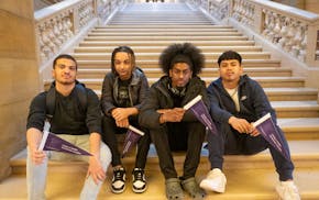 Julian Spencer, Boogie Davis, JD Mansaray and Jose Perez of Good Trouble attend Literacy Day in April at the State Capitol.