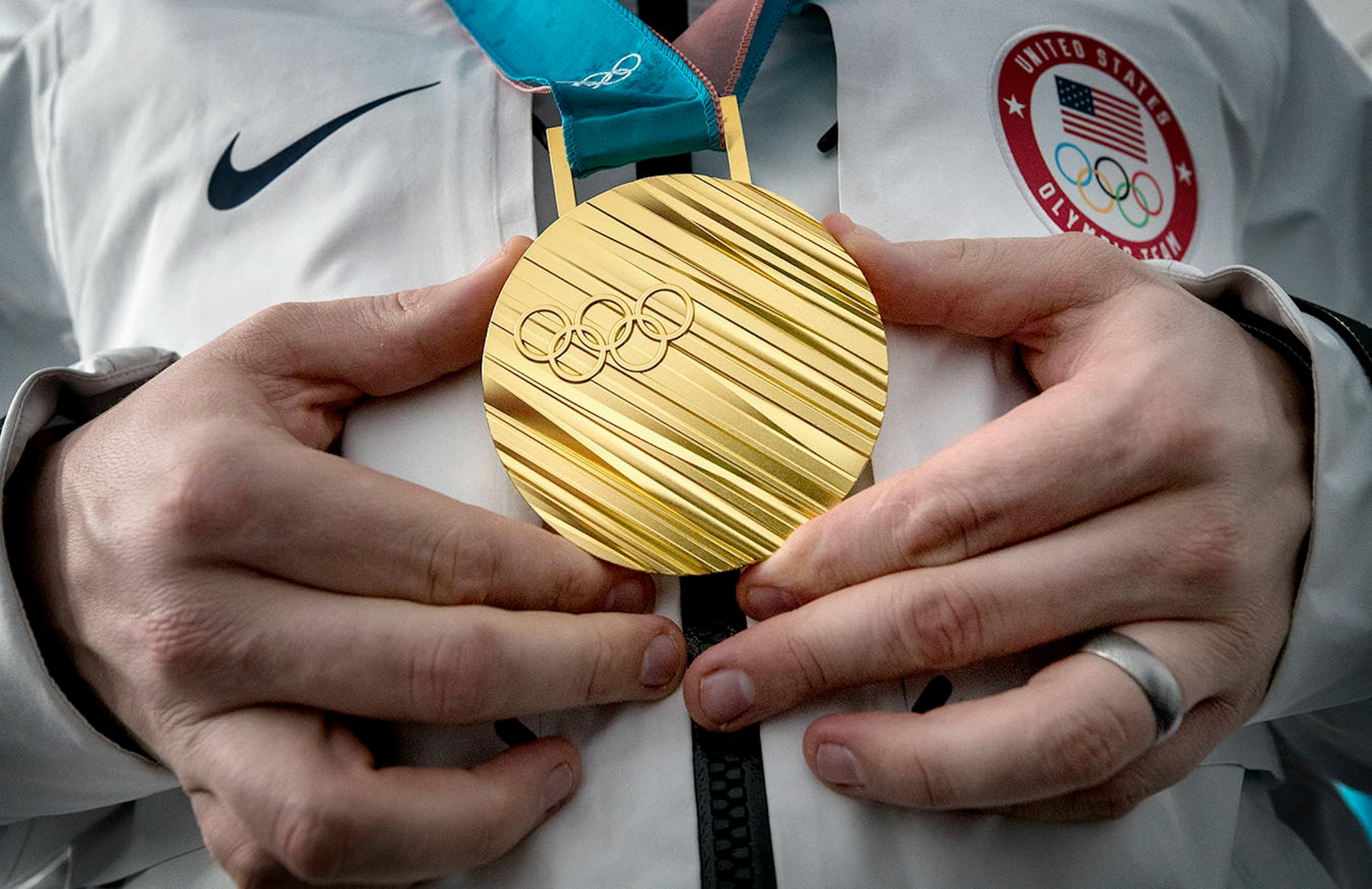Team USA's Matt Hamilton with a gold medal after a 10-7 win against Sweden on Saturday, Feb. 24, 2018, at the Pyeongchang Winter Olympics' Gangneung Curling Centre.