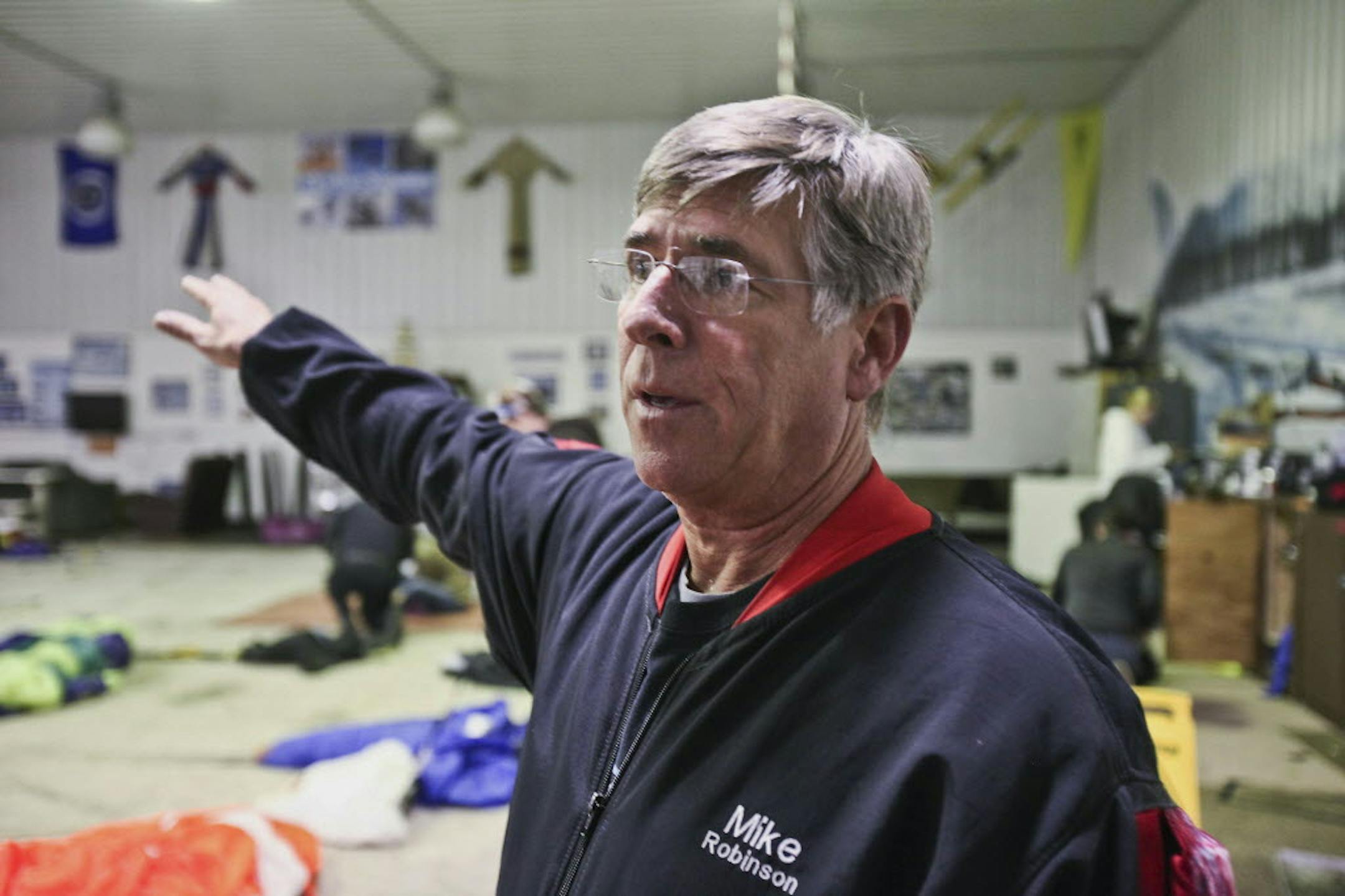 Mike Robinson, an instructor and safety adviser for Skydive Superior, describes the circumstances that caused a Cessna 185 and a Cessna 182 to collide in midair Saturday.