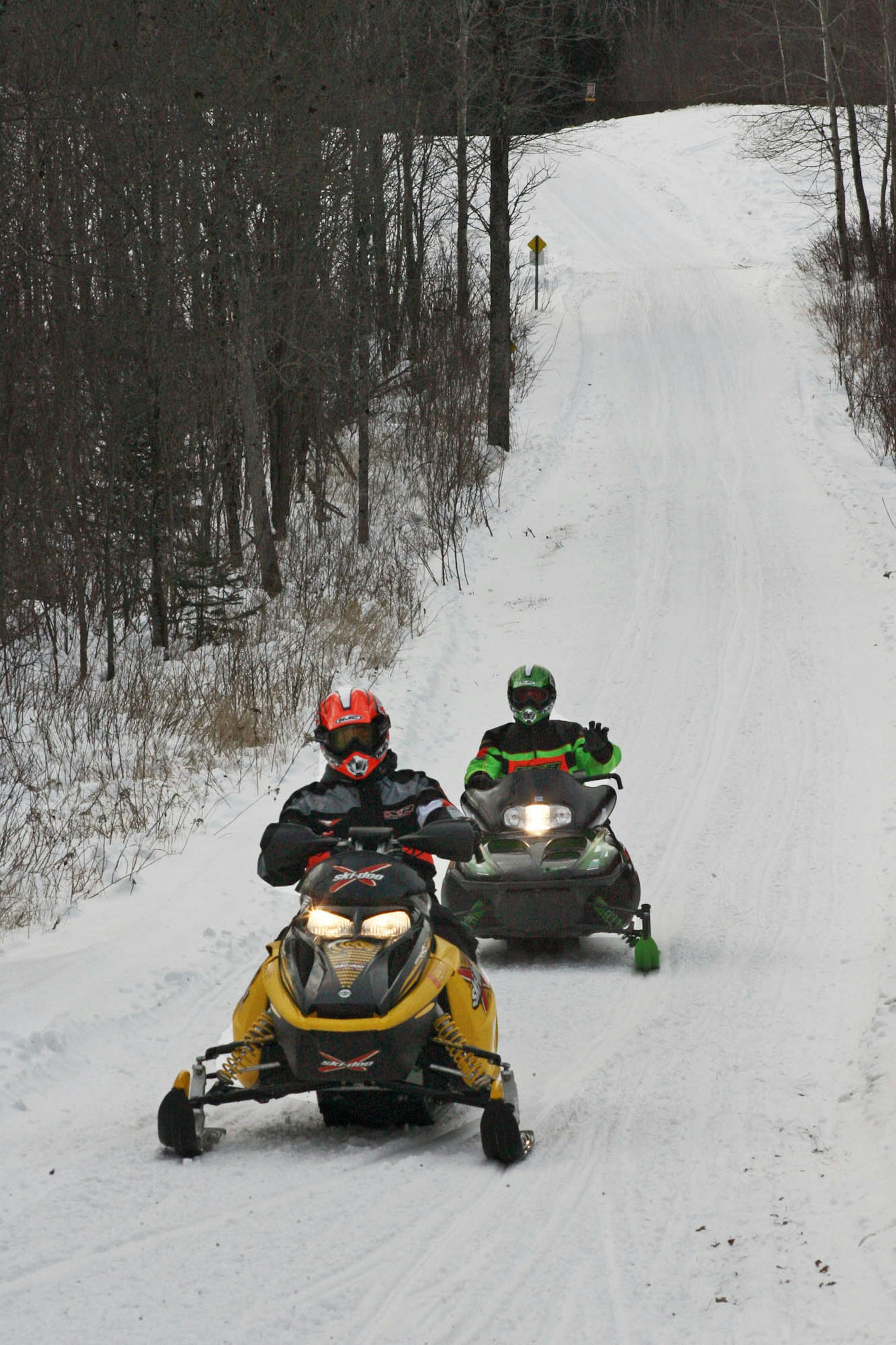 Cory Schlechter of Blaine, front, and Dave Hoag of Centerville made their way down the North Shore snowmobile trail near Silver Bay.