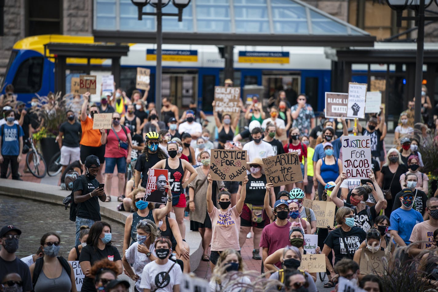 A solidarity rally and march for Jacob Blake in front of the Hennepin County Government Center. ] LEILA NAVIDI • leila.navidi@startribune.com BACKGROUND INFORMATION: A solidarity rally and march for Jacob Blake started in front of the Hennepin County Government Center in downtown Minneapolis on Monday, August 24, 2020.