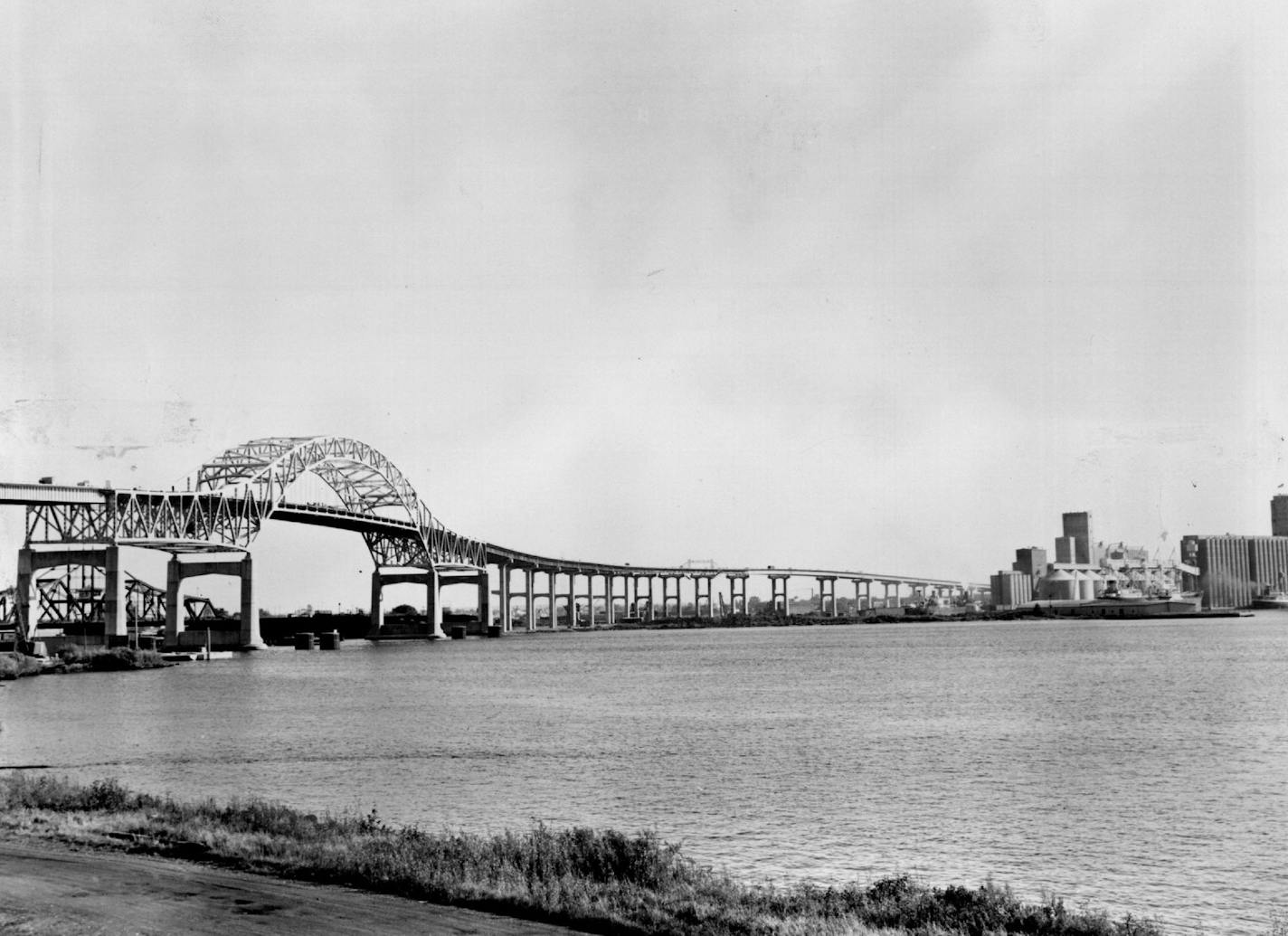 December 1, 1961 Bridge Open - The new interstate high bridge connecting Duluth, Minn., and Superior, Wis., will be dedicated and formally opened in ceremonies Saturday. The 7,975-foot bridge-almost two miles including the approaches-is toll-free and features a clearance of 120 feet at the center span making it possible for ships from all parts of the world to move in and out of the area without the bridge being opened. December 2, 1961