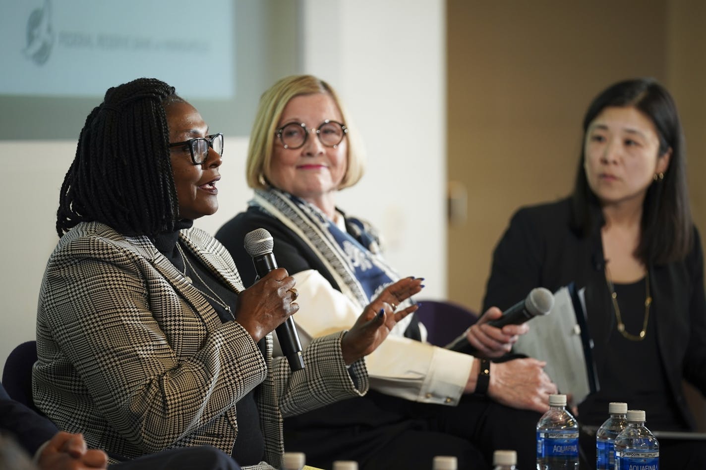 State Rep. Rena Moran, left, spoke while on a Community Response Panel with Kathleen Harrington of the Rochester Chamber of Commerce and moderator Alene Tchourumoff of the Federal Reserve.