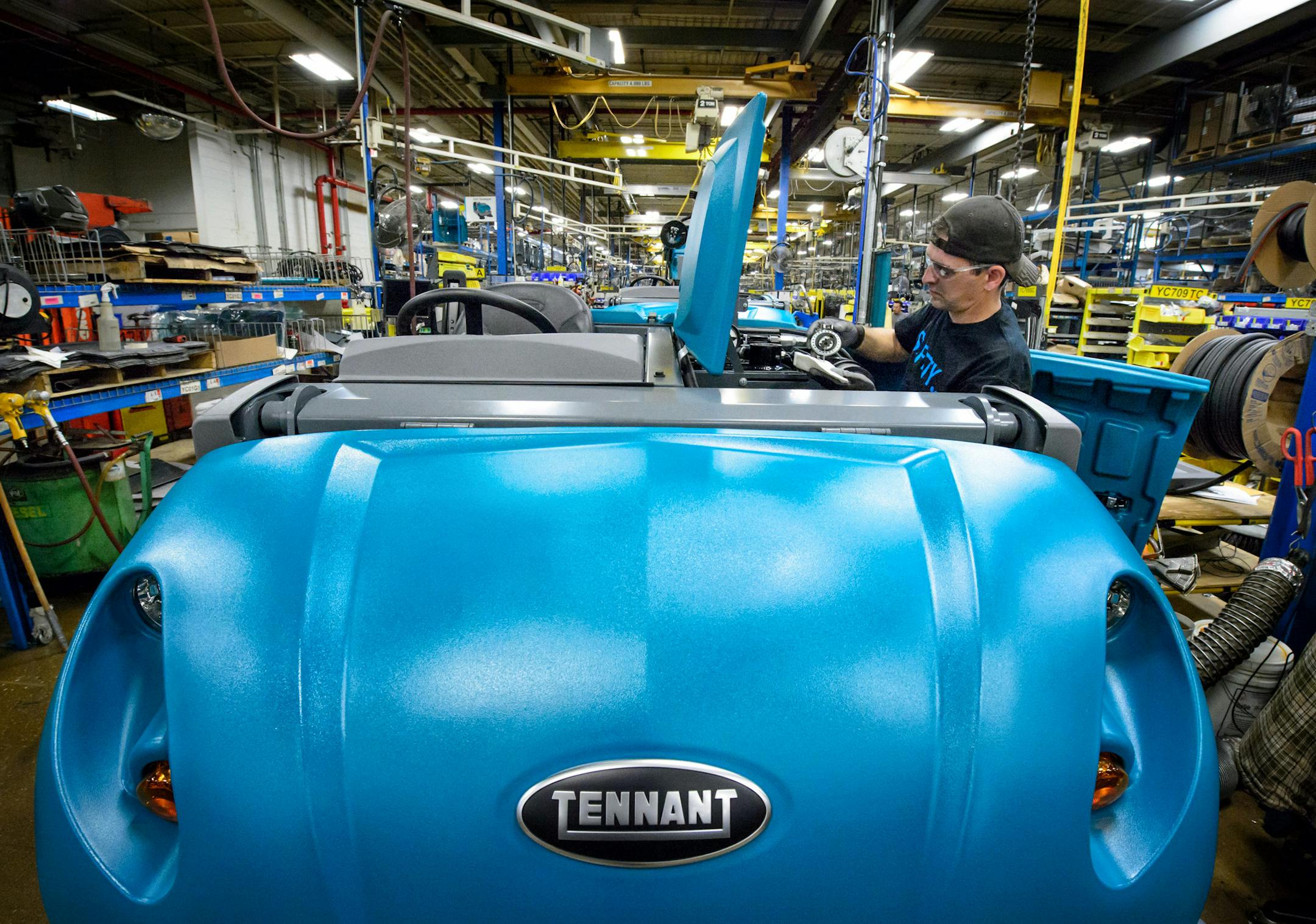 Martin Holiday put the finishing touches on a S30 sweeper in the Tennant Company manufacturing facility in Golden Valley. ] GLEN STUBBE * gstubbe@startribune.com Tuesday, November 3, 2015 Tennant Company headquarters in Golden Valley, MN