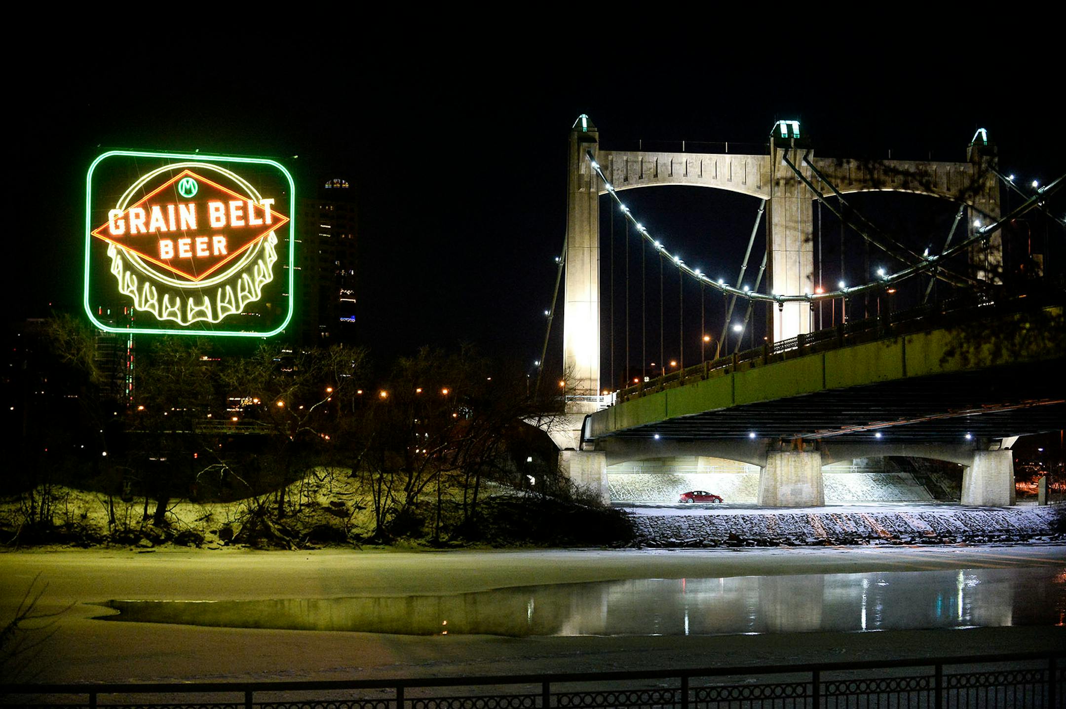 The re-lit Grain Belt sign Saturday night.
