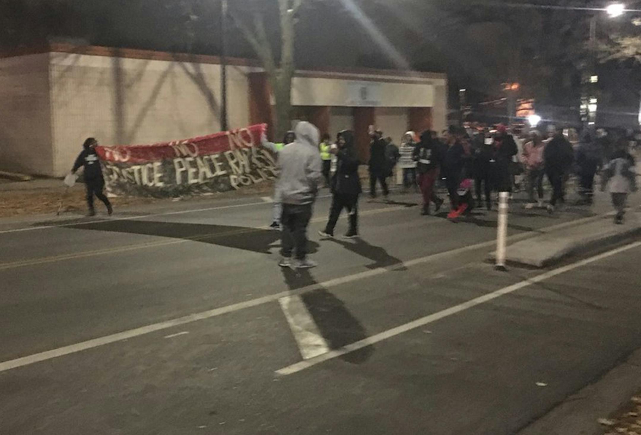 Nearly 200 people marched Thursday night down Plymouth Avenue N. in Minneapolis toward the Fourth Precinct police station as part of a tribute to Jamar Clark on the third anniversary of his shooting death by police.