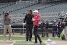 PGA Tour star Stacy Lewis and PGA Tour star Phil Mickelson took turns trying to hit famous Twins history golf targets from home plate. ] MARK VANCLEAV
