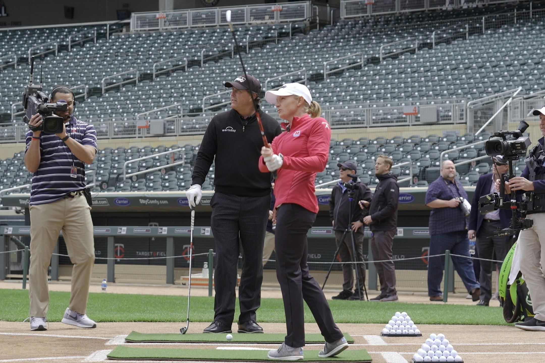 PGA Tour star Stacy Lewis and PGA Tour star Phil Mickelson took turns trying to hit famous Twins history golf targets from home plate. ] MARK VANCLEAVE ¥ LPGA Tour star Stacy Lewis and PGA Tour star Phil Mickelson took turns trying to hit famous Twins history golf targets from home plate at Target Field Monday, May 6, 2019.